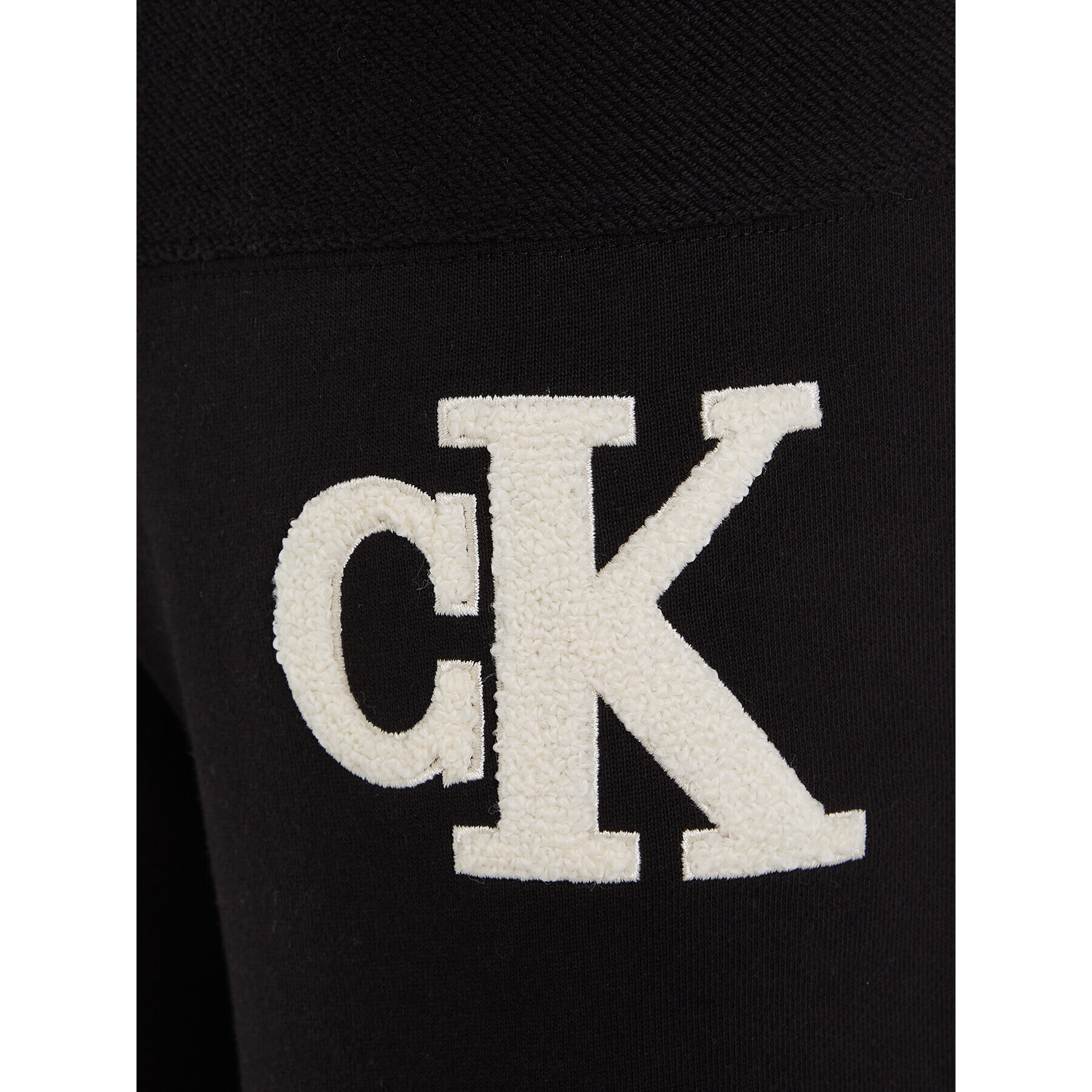 Calvin Klein Jeans Teplákové kalhoty Towelling Logopack IB0IB01677 Černá Regular Fit - Pepit.cz