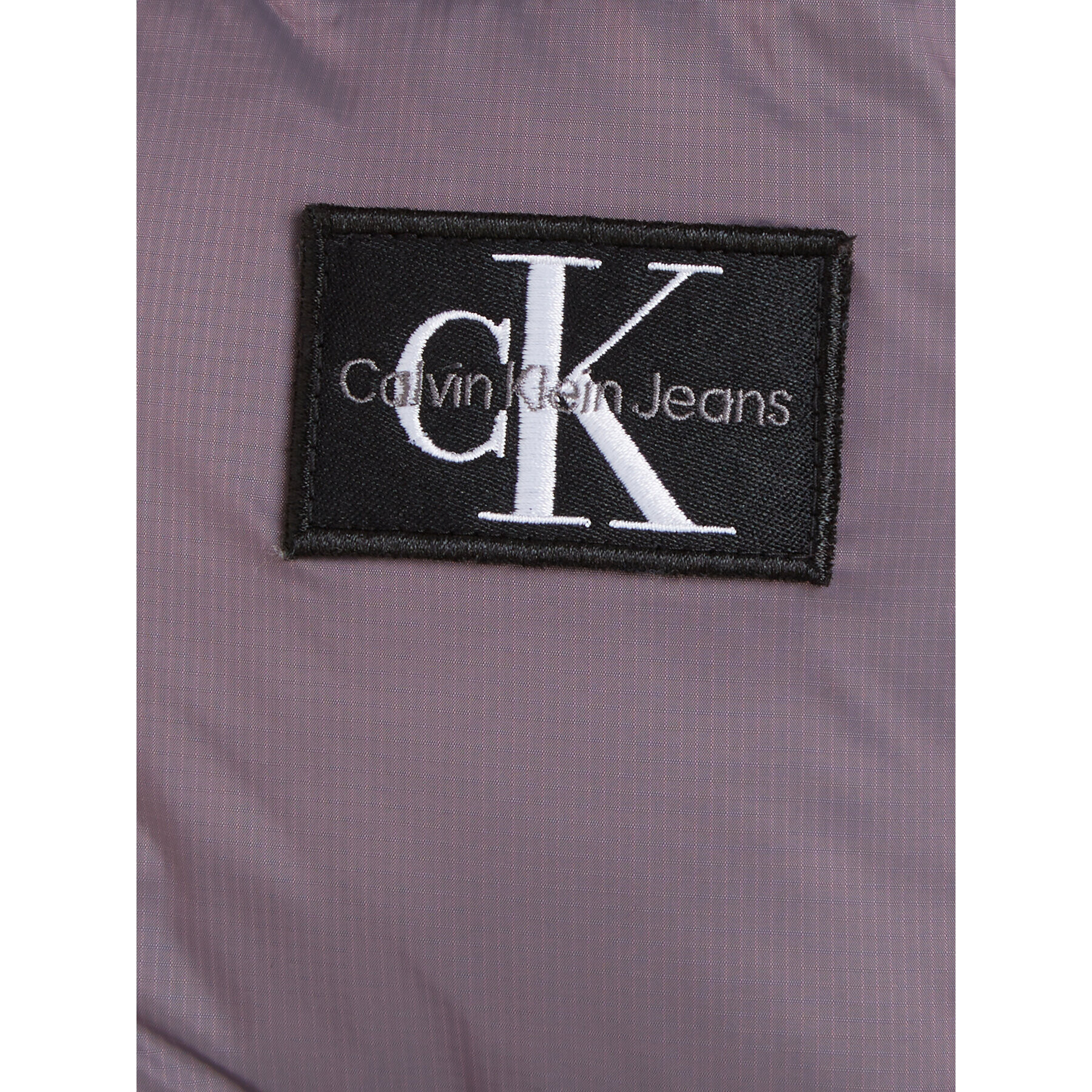 Calvin Klein Jeans Vatovaná bunda Hyper Two Tone IB0IB01818 Fialová Regular Fit - Pepit.cz