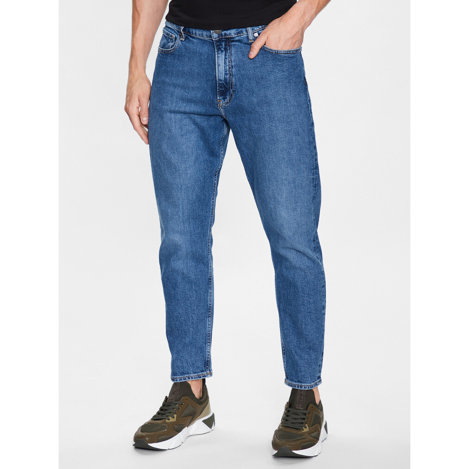 Calvin Klein Jeansy K10K110956 Tmavomodrá Tapered Fit - Pepit.cz