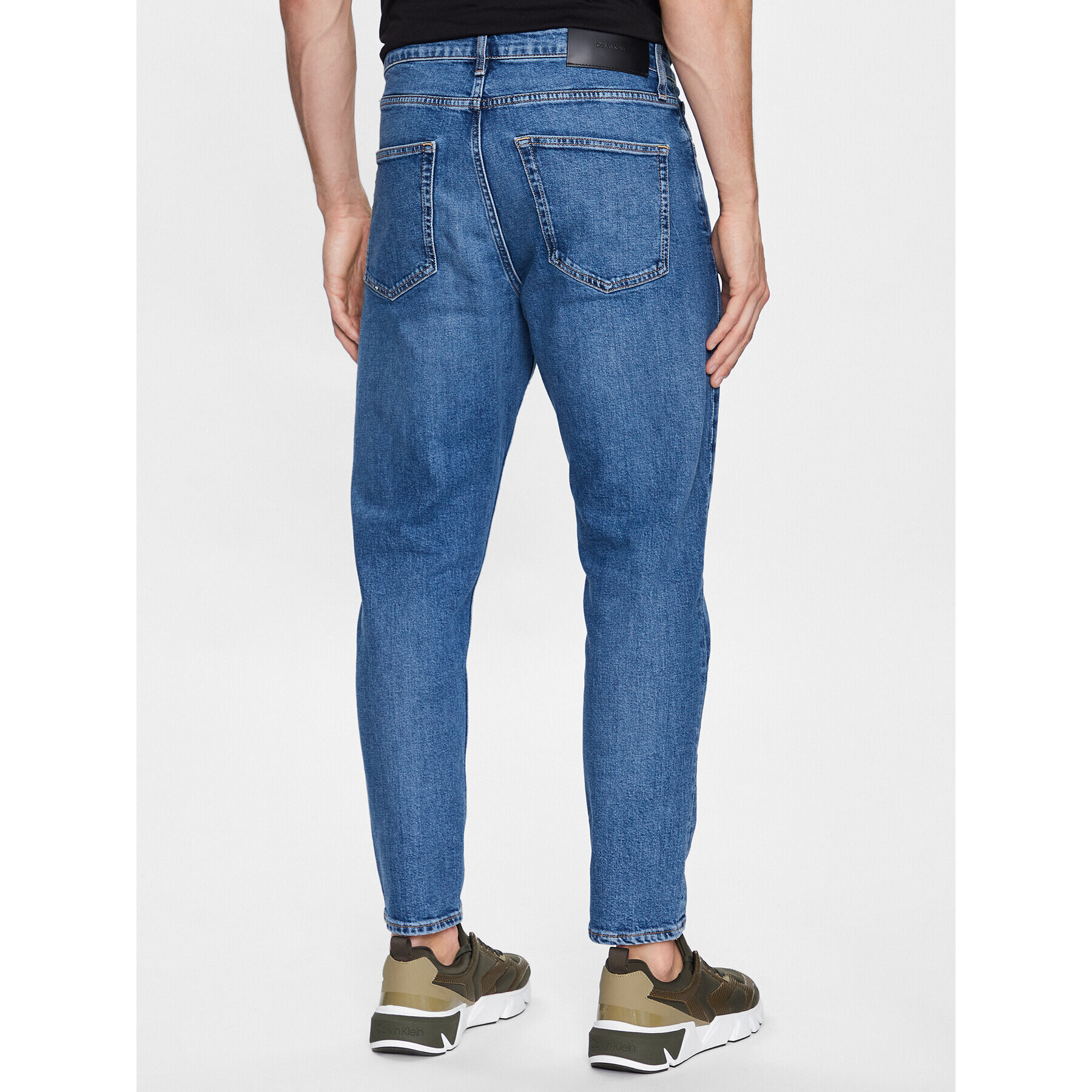 Calvin Klein Jeansy K10K110956 Tmavomodrá Tapered Fit - Pepit.cz