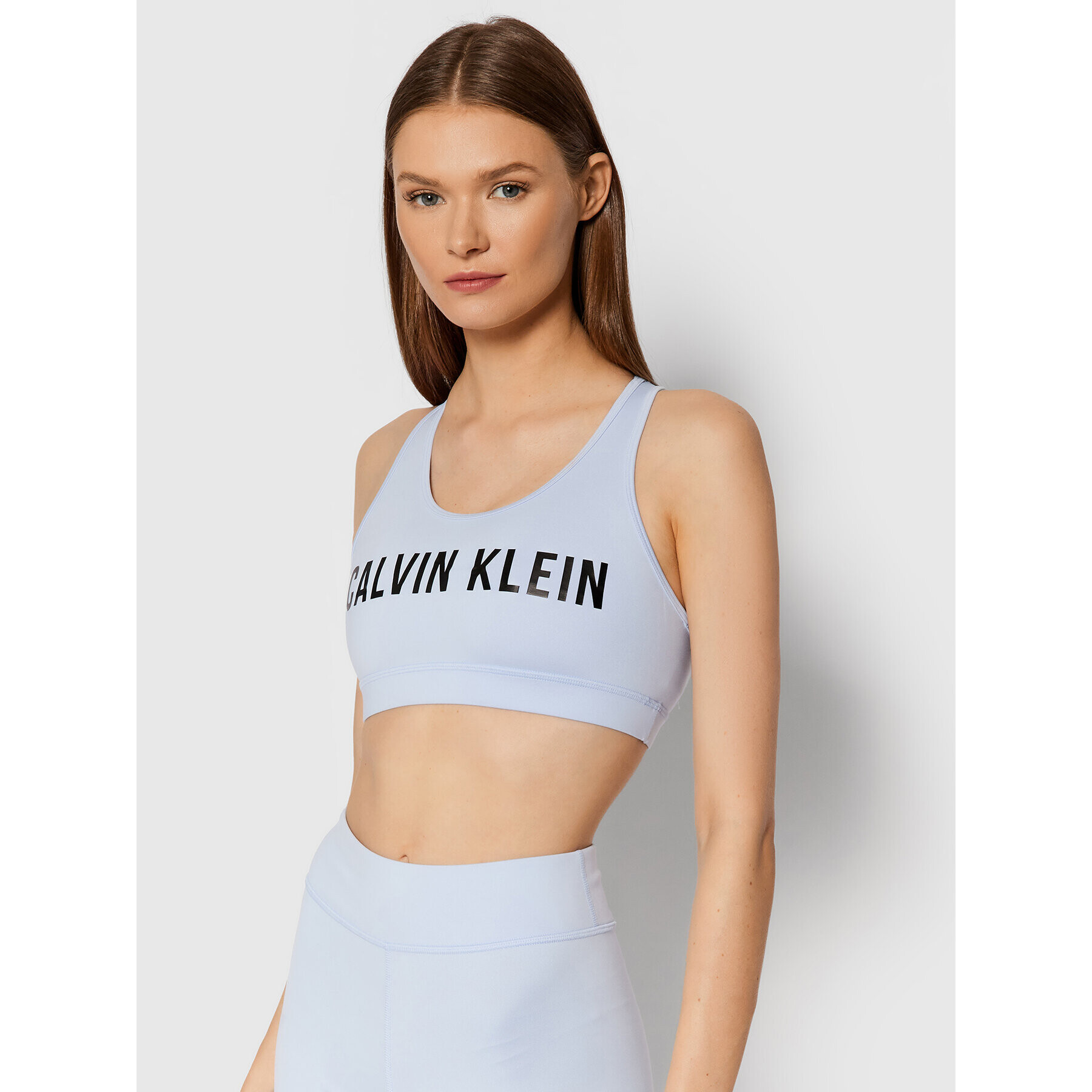 Calvin Klein Performance Sportovní podprsenka Medium Support 00GWF0K157 Modrá - Pepit.cz