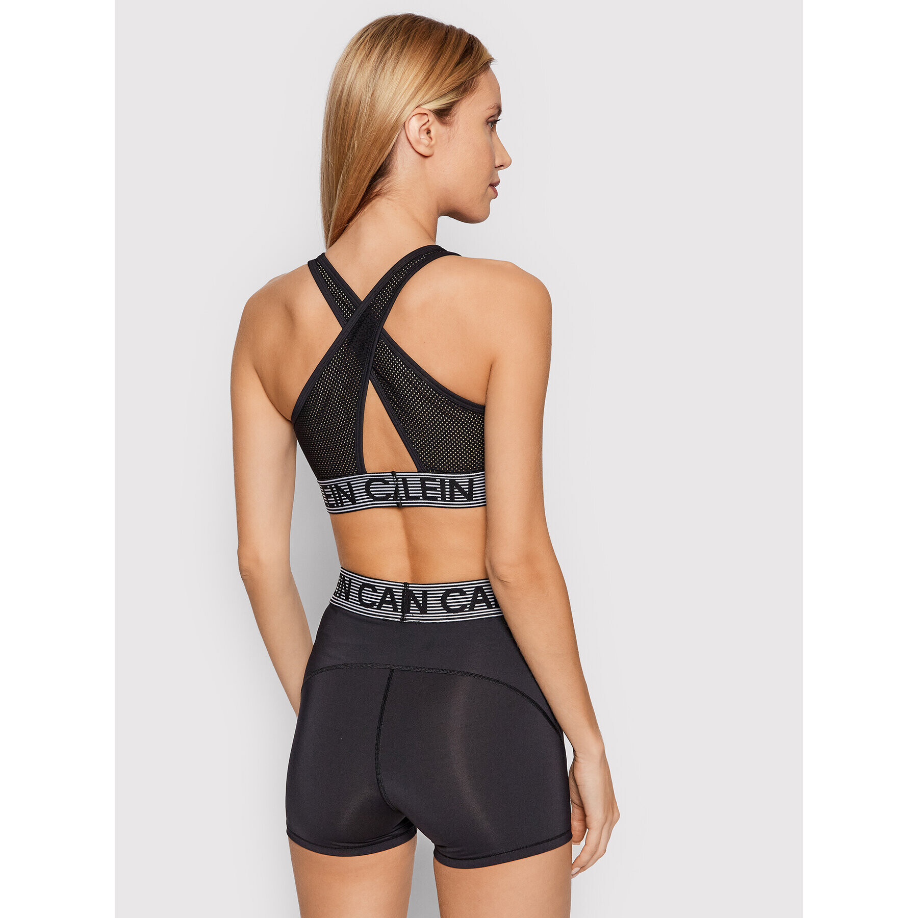 Calvin Klein Performance Sportovní podprsenka Medium Support Sports 00GWF1K108 Černá - Pepit.cz