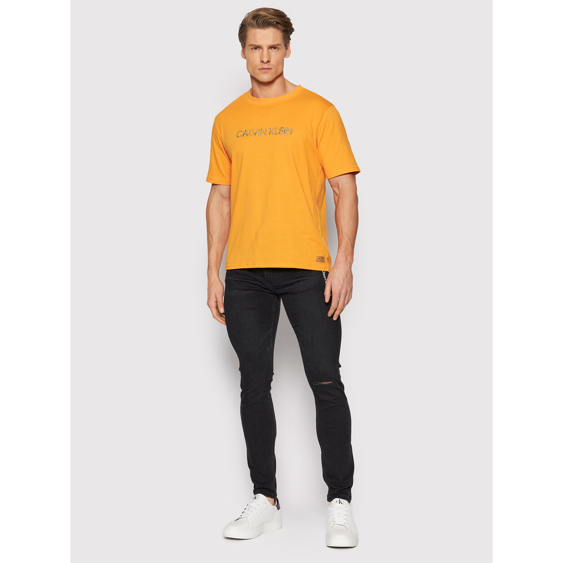 Calvin Klein Performance T-Shirt 00GMH1K104 Oranžová Regular Fit - Pepit.cz