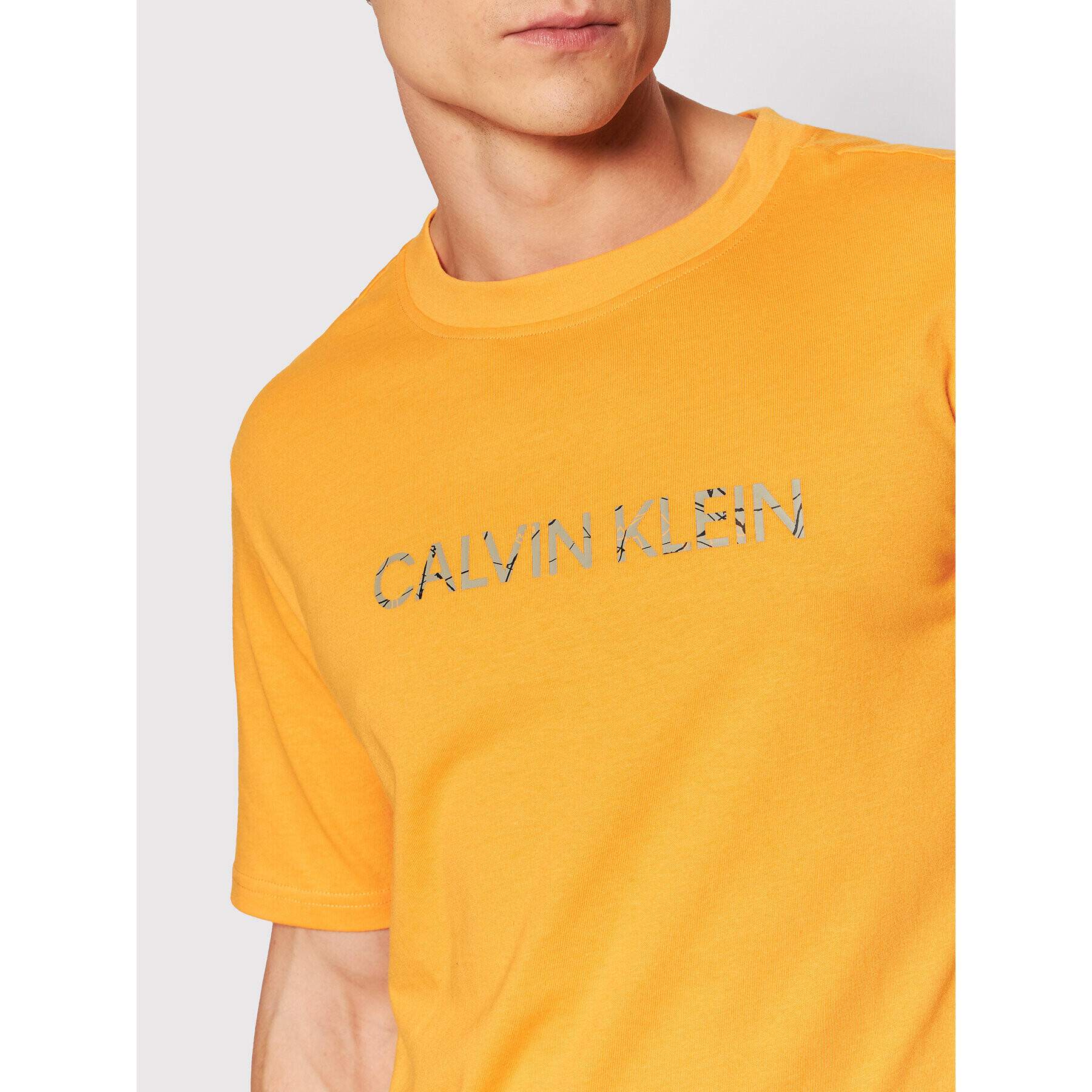 Calvin Klein Performance T-Shirt 00GMH1K104 Oranžová Regular Fit - Pepit.cz