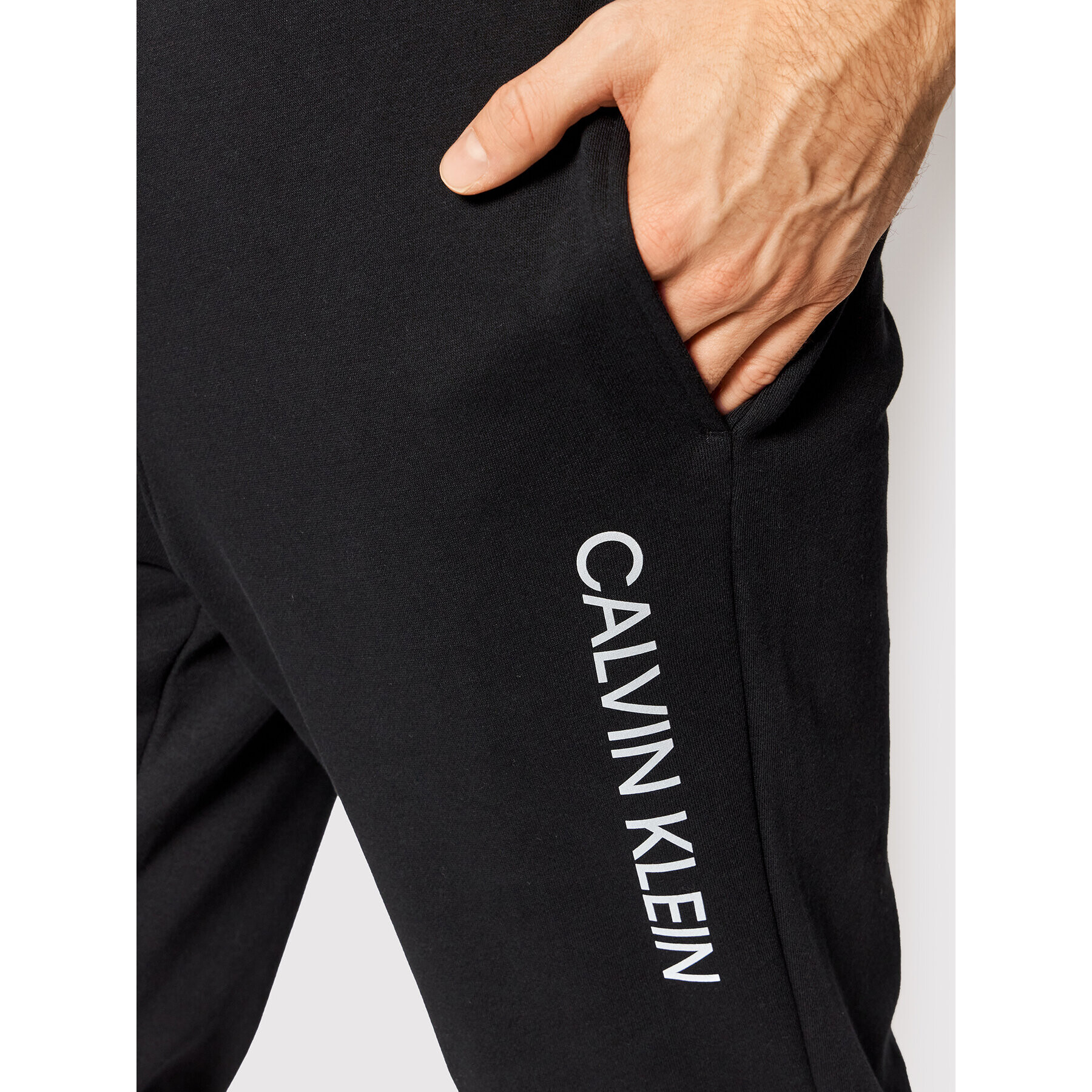 Calvin Klein Performance Teplákové kalhoty 00GMF1P606 Černá Regular Fit - Pepit.cz