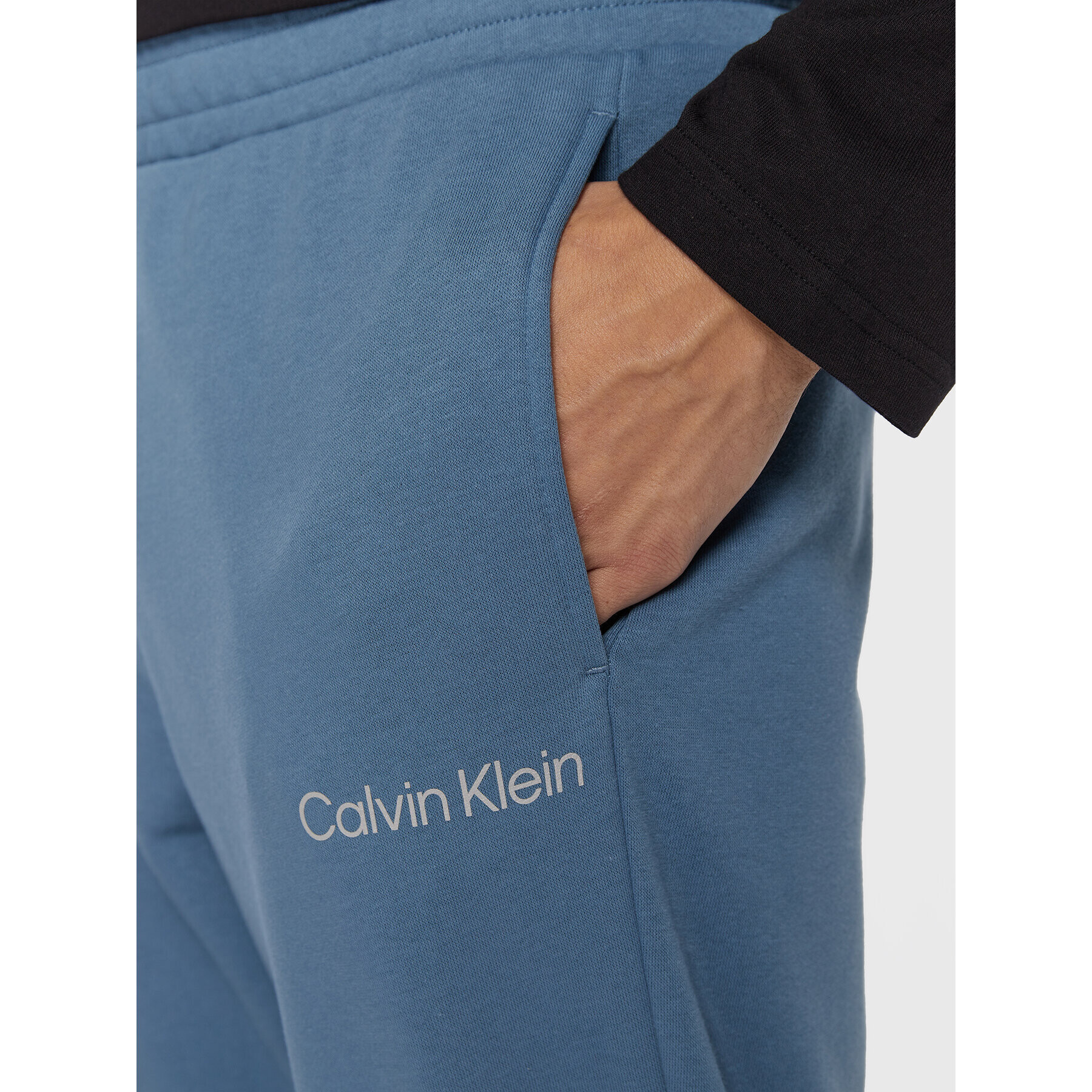 Calvin Klein Performance Teplákové kalhoty 00GMS2P606 Modrá Regular Fit - Pepit.cz