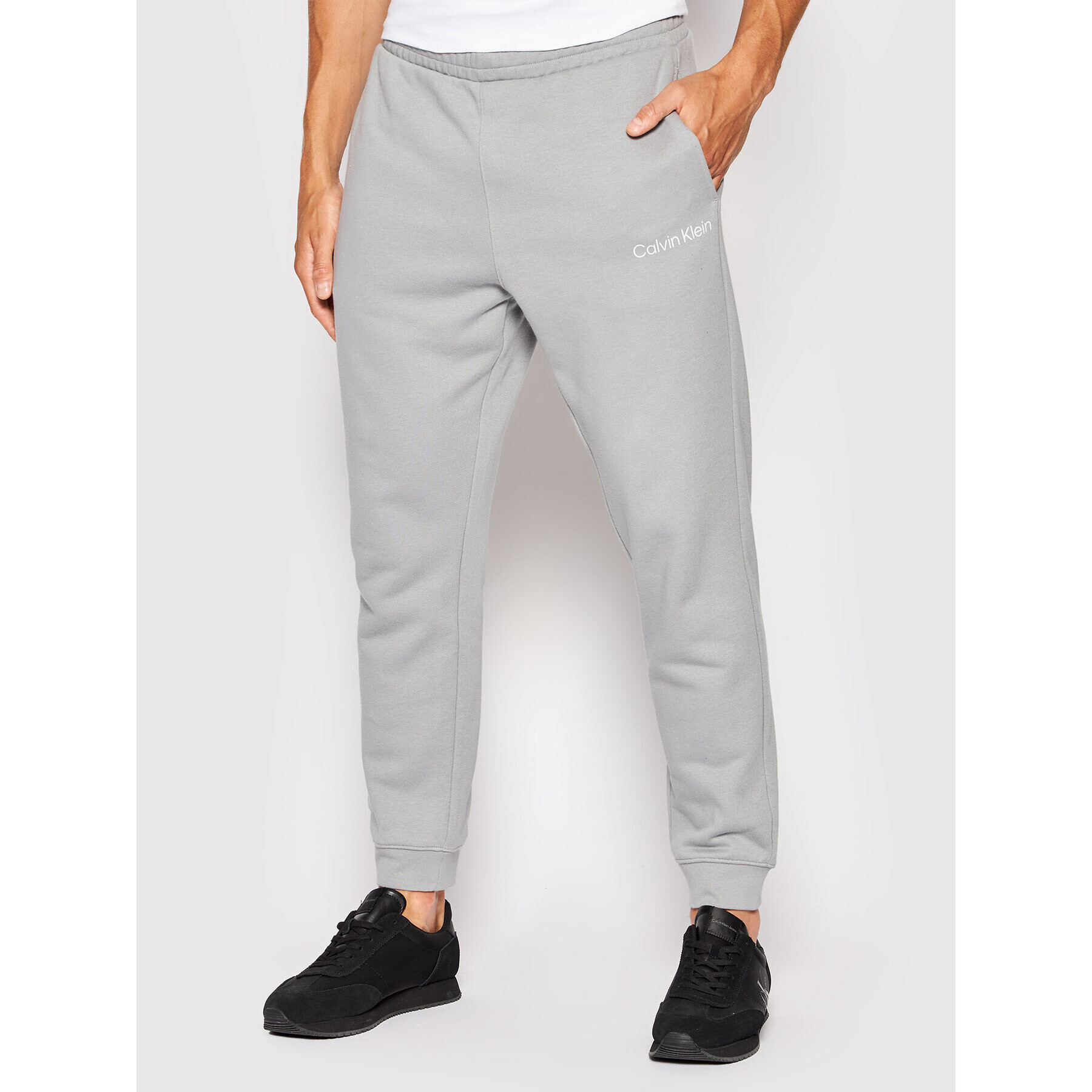 Calvin Klein Performance Teplákové kalhoty 00GMS2P606 Šedá Regular Fit - Pepit.cz