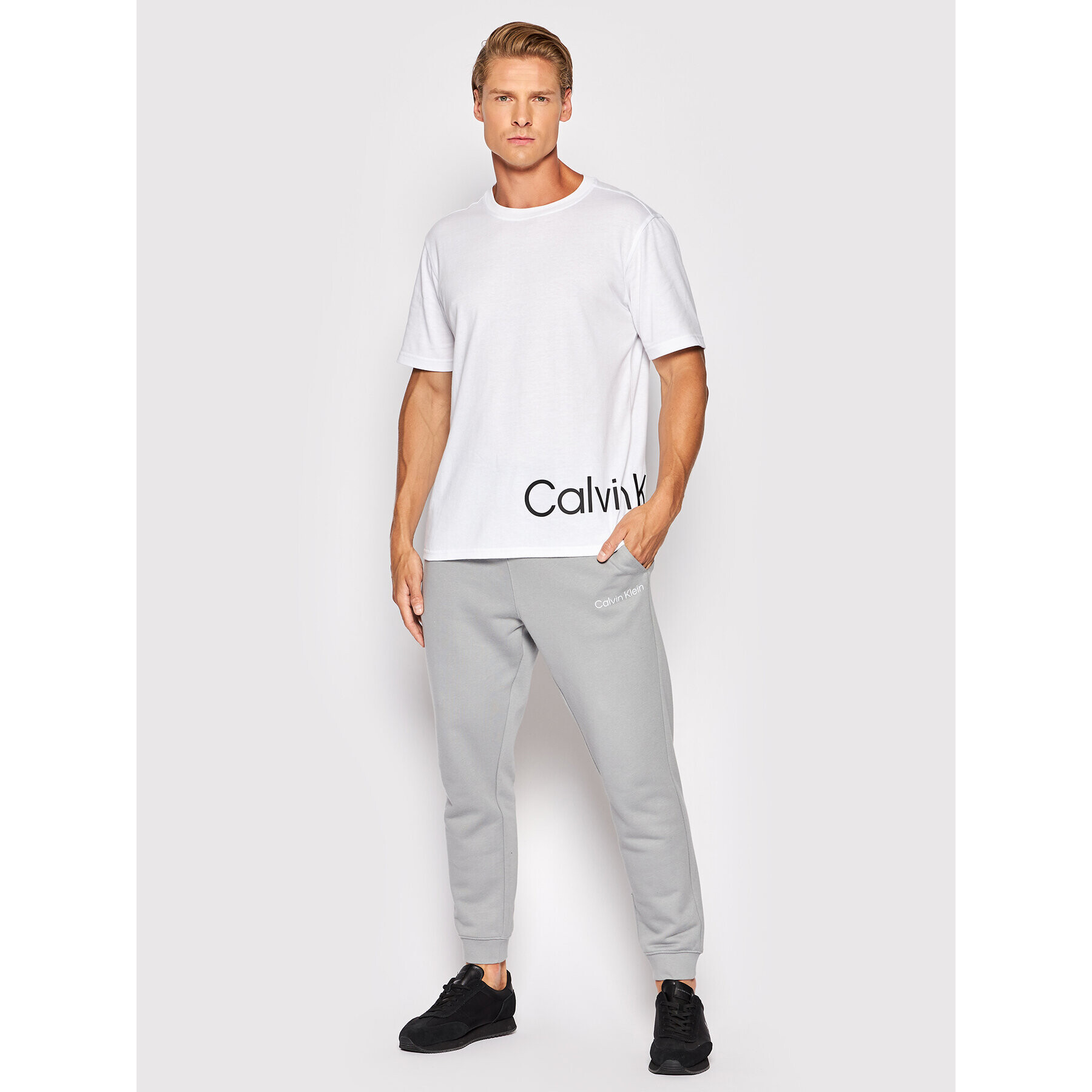 Calvin Klein Performance Teplákové kalhoty 00GMS2P606 Šedá Regular Fit - Pepit.cz