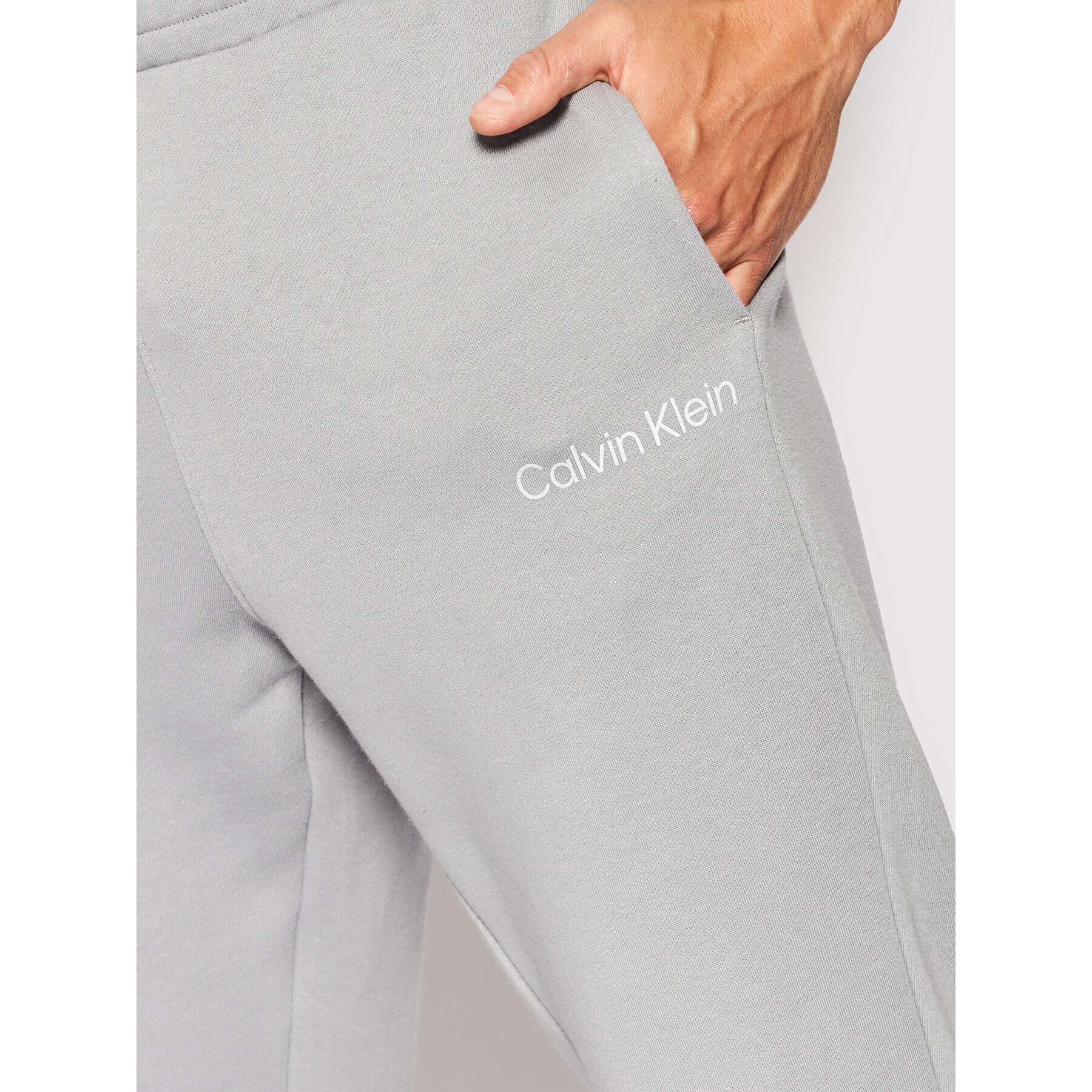 Calvin Klein Performance Teplákové kalhoty 00GMS2P606 Šedá Regular Fit - Pepit.cz