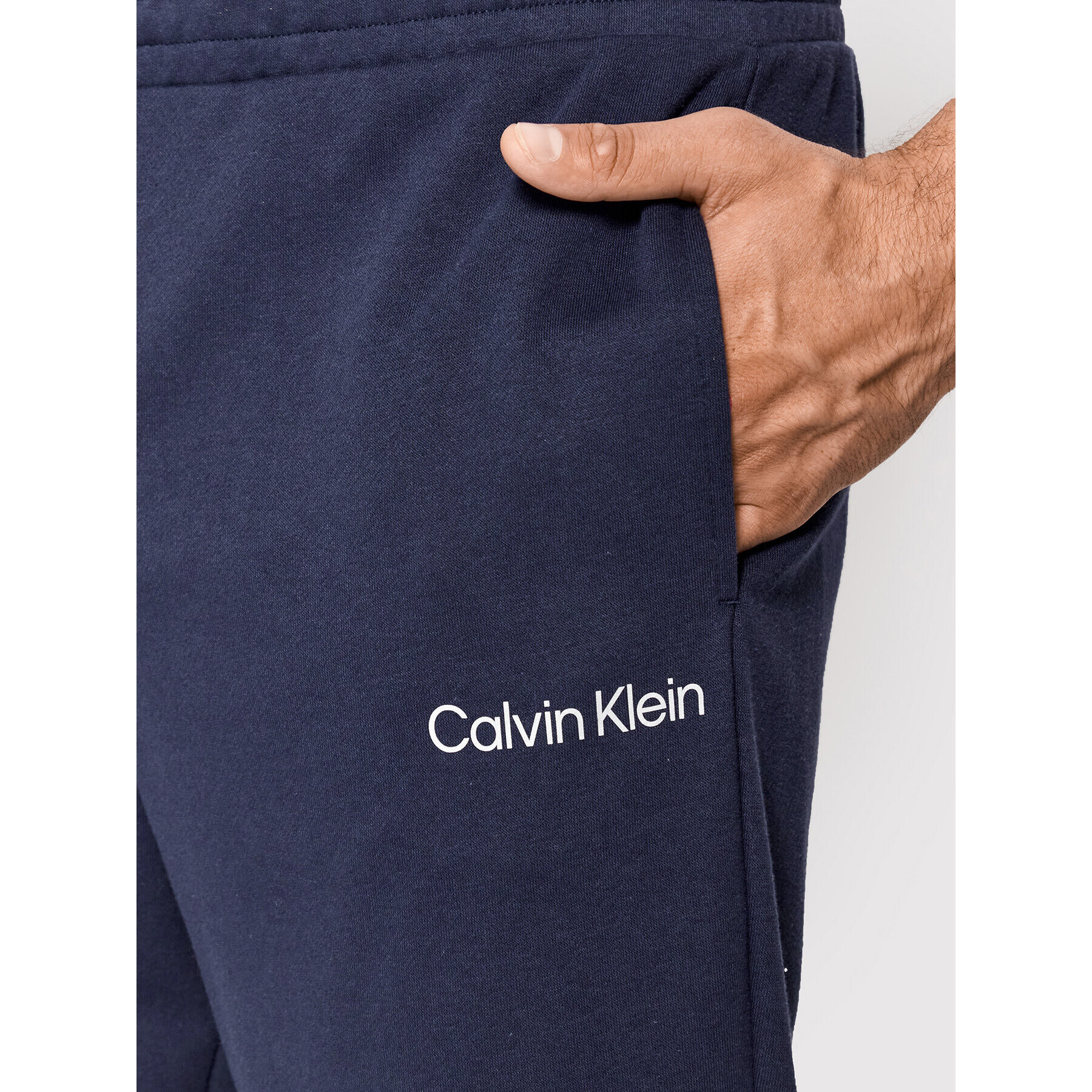 Calvin Klein Performance Teplákové kalhoty 00GMS2P606 Tmavomodrá Regular Fit - Pepit.cz