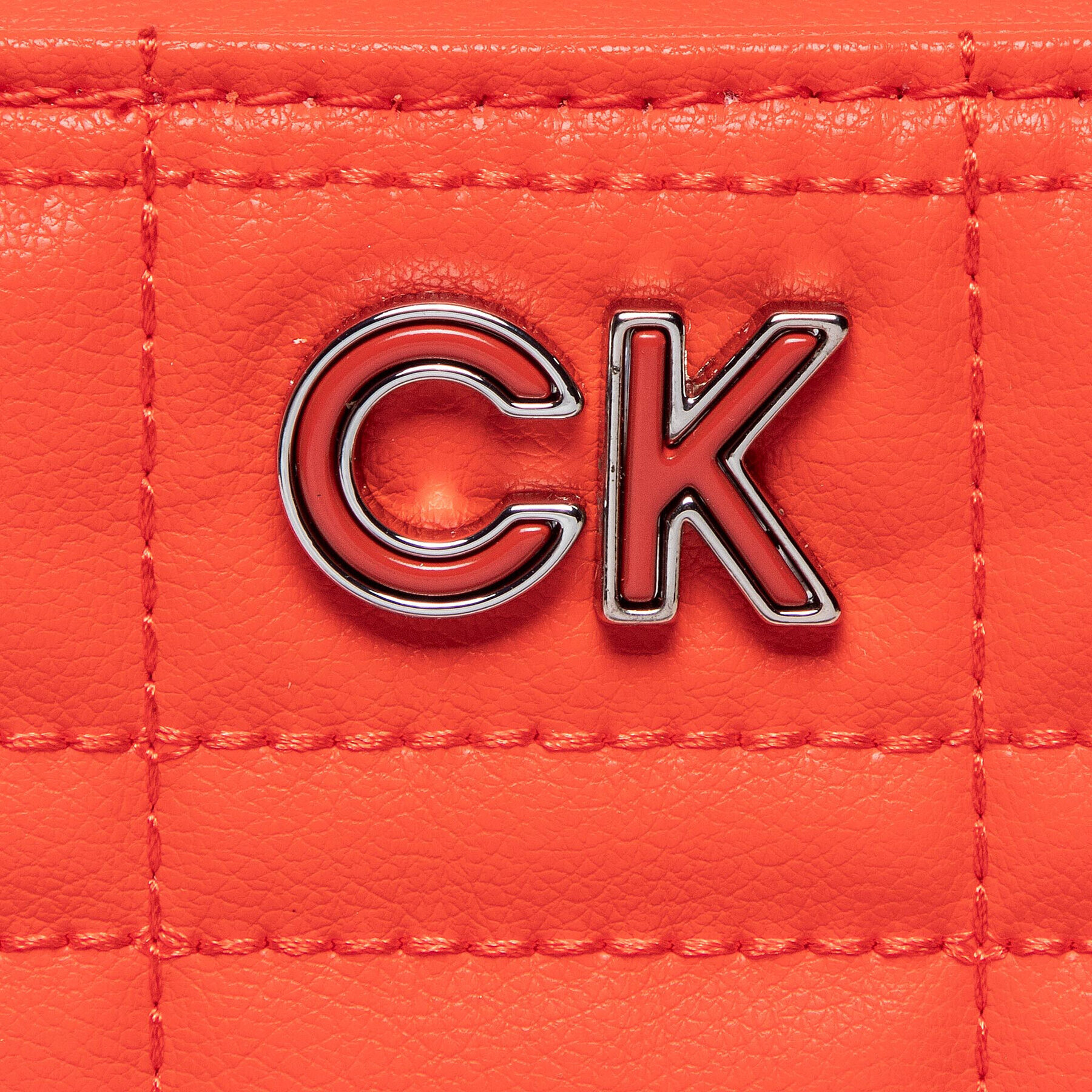 Calvin Klein Pouzdro na mobil Re-Lock Quilt Phone Pouch K60K609911 Korálová - Pepit.cz