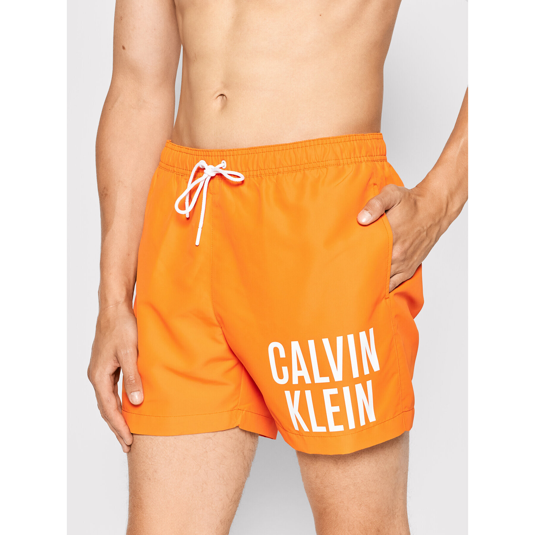 Calvin Klein Swimwear Plavecké šortky Intense Power KM0KM00701 Oranžová Regular Fit - Pepit.cz