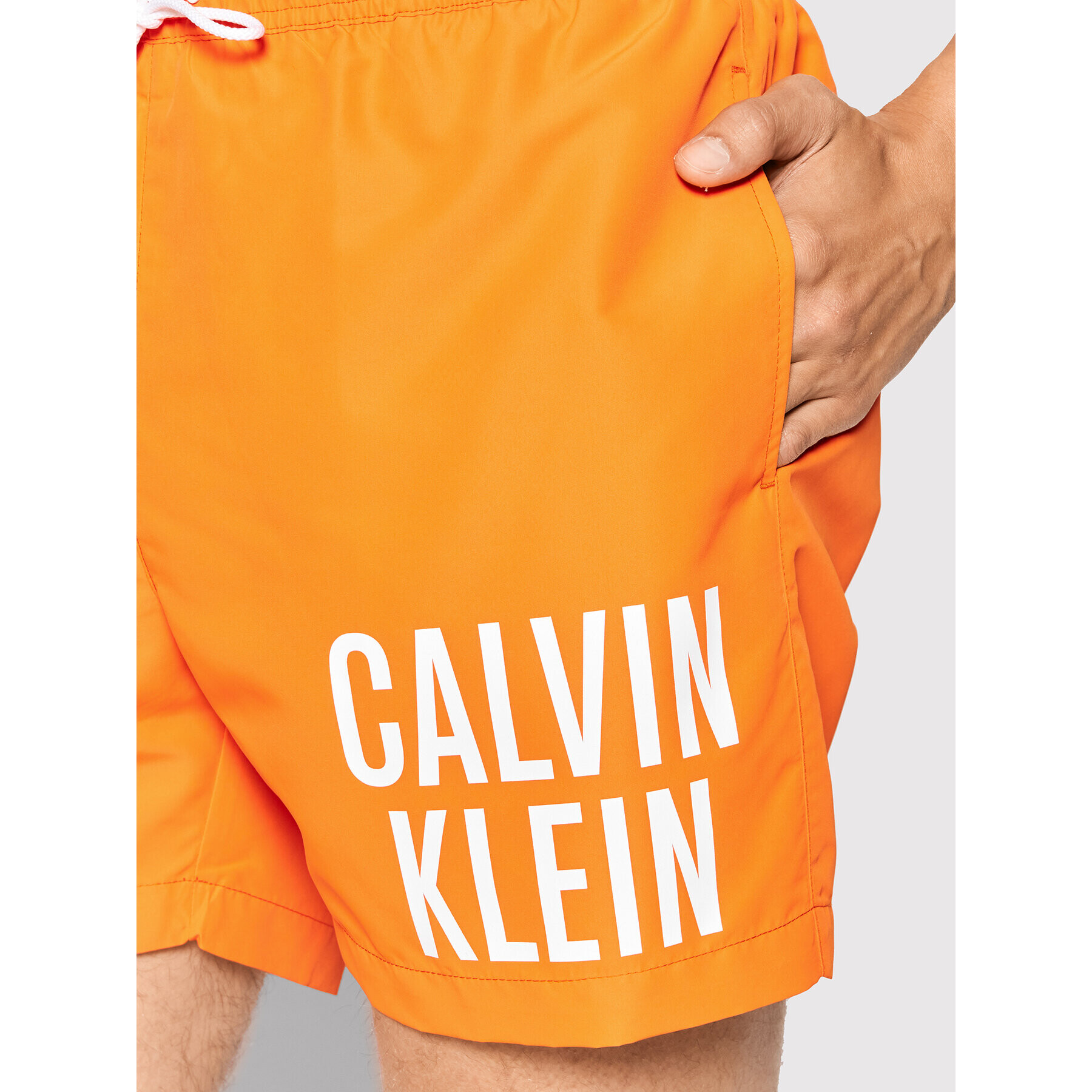 Calvin Klein Swimwear Plavecké šortky Intense Power KM0KM00701 Oranžová Regular Fit - Pepit.cz