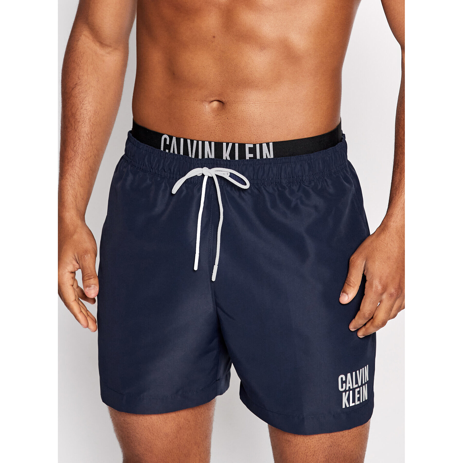 Calvin Klein Swimwear Plavecké šortky Intense Power KM0KM00702 Tmavomodrá Regular Fit - Pepit.cz