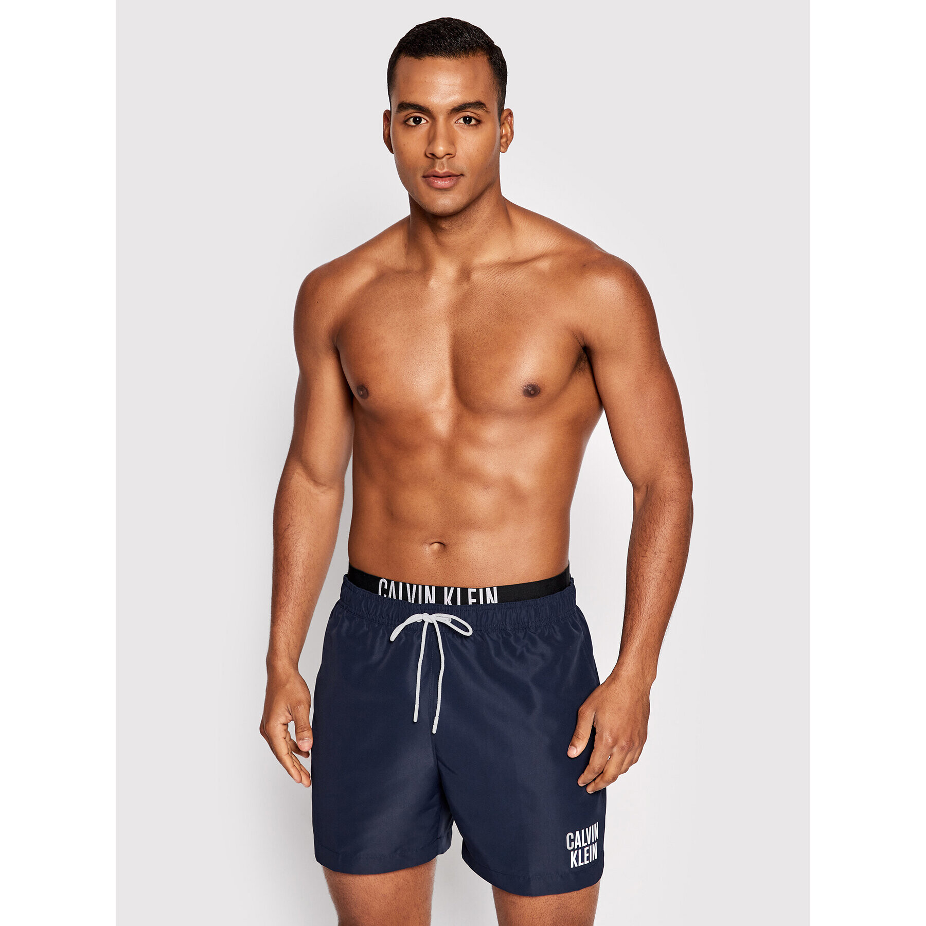 Calvin Klein Swimwear Plavecké šortky Intense Power KM0KM00702 Tmavomodrá Regular Fit - Pepit.cz