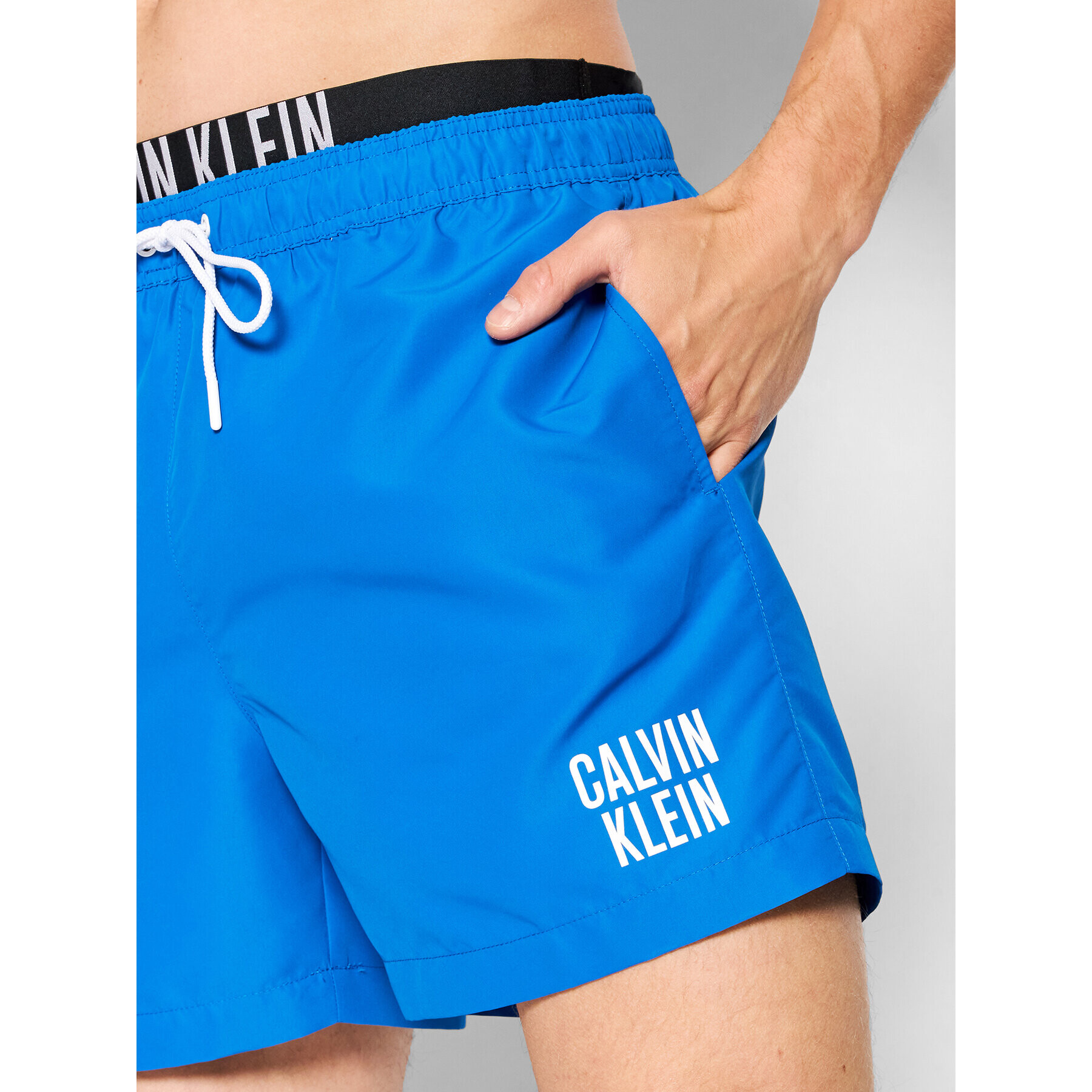 Calvin Klein Swimwear Plavecké šortky KM0KM00702 Modrá Regular Fit - Pepit.cz