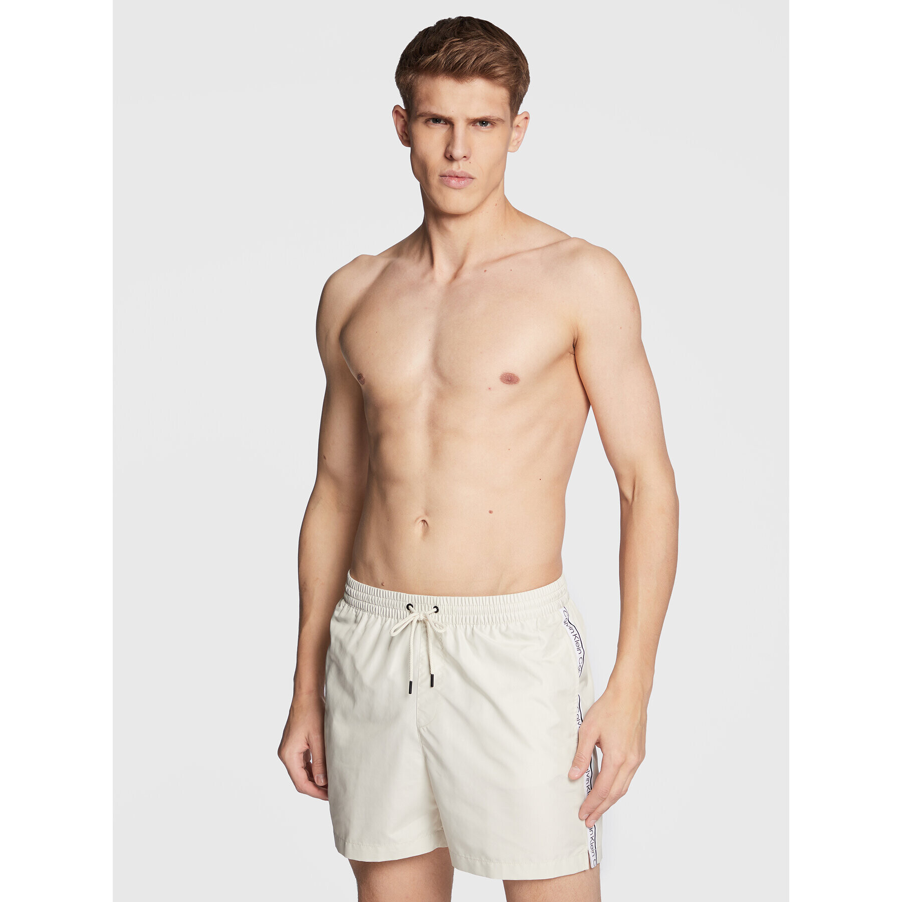 Calvin Klein Swimwear Plavecké šortky KM0KM00789 Écru Regular Fit - Pepit.cz