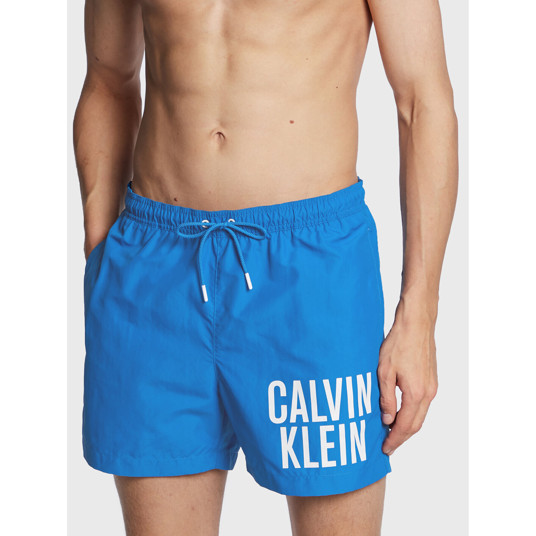 Calvin Klein Swimwear Plavecké šortky KM0KM00794 Modrá Regular Fit - Pepit.cz