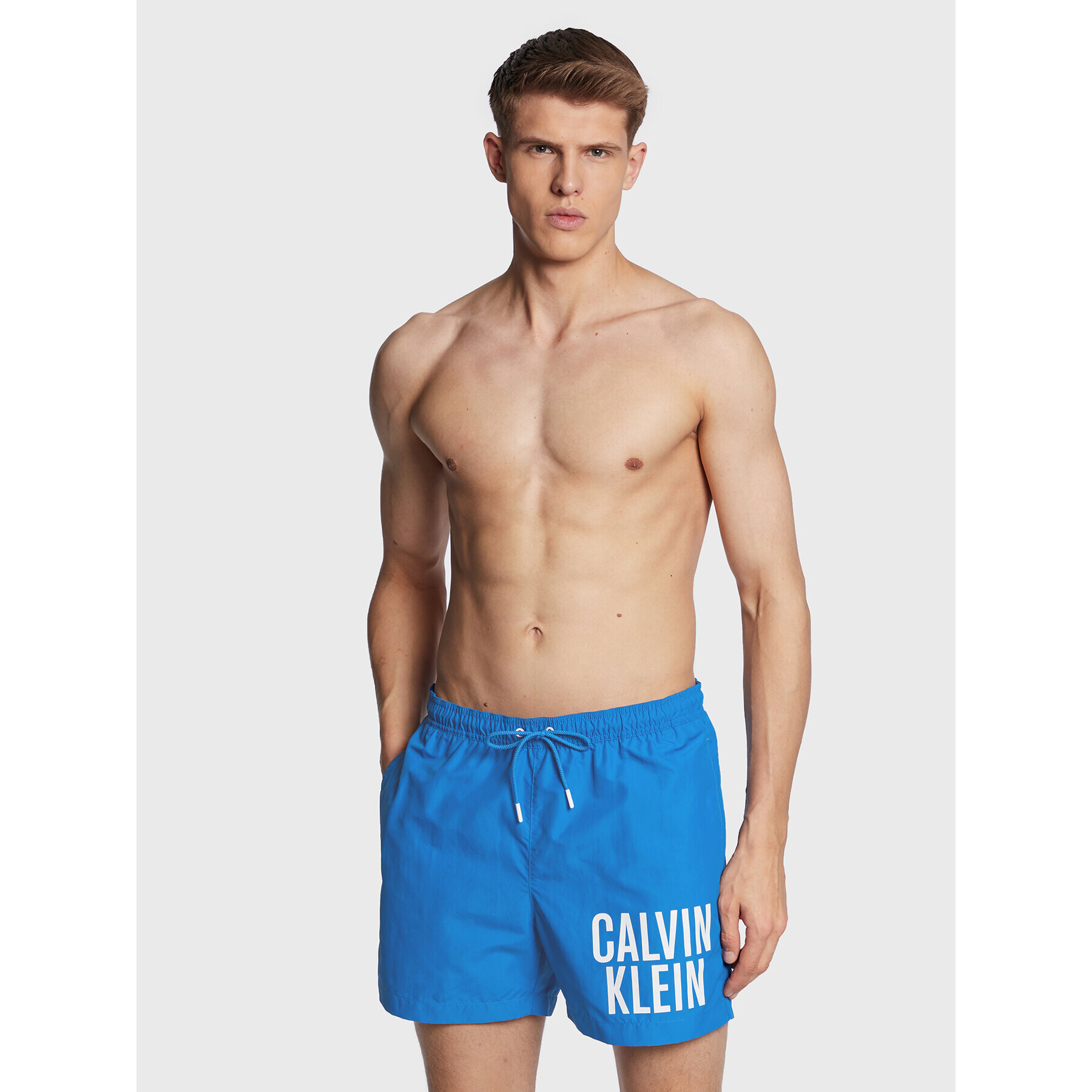 Calvin Klein Swimwear Plavecké šortky KM0KM00794 Modrá Regular Fit - Pepit.cz