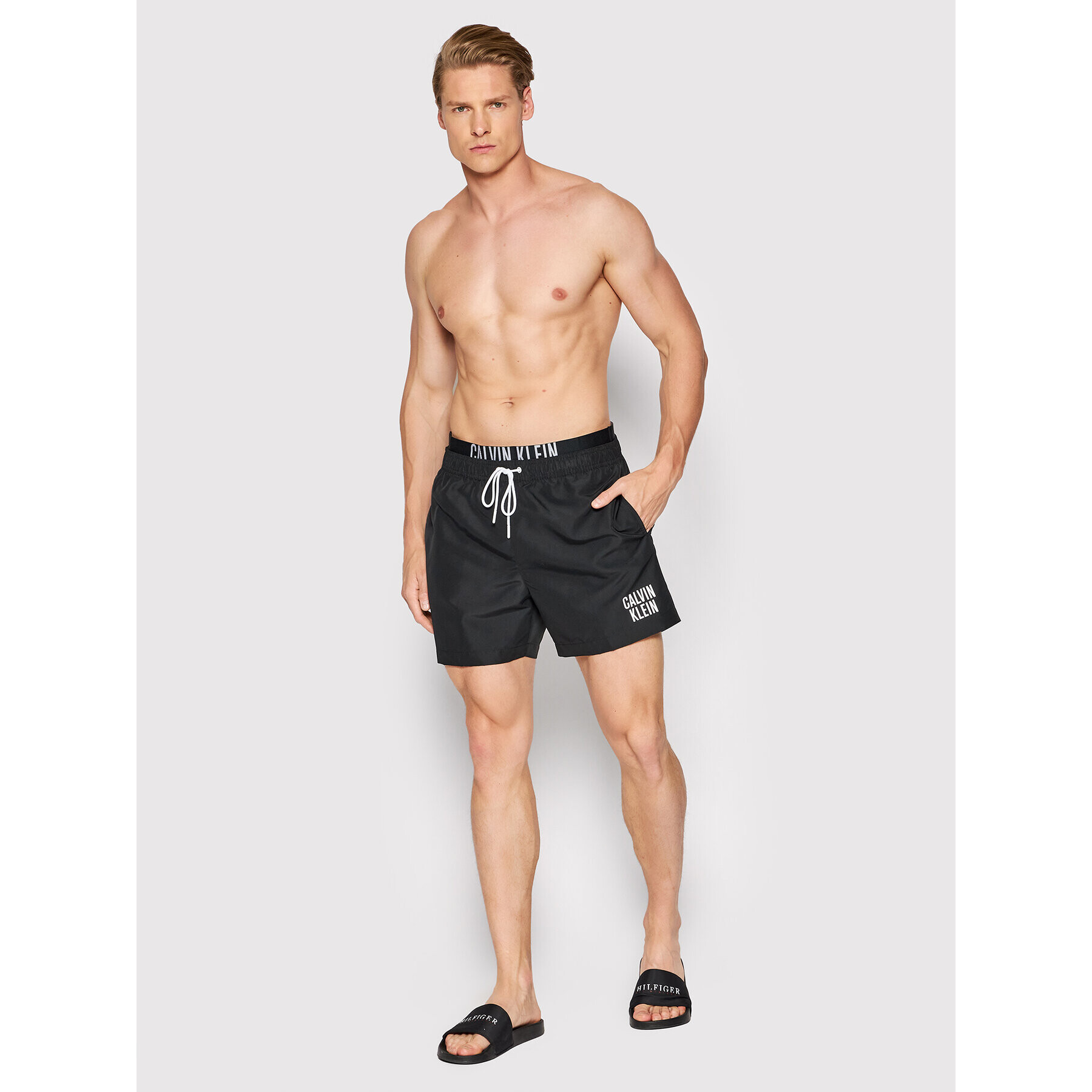 Calvin Klein Swimwear Plavecké šortky Medium Double KM0KM00740 Černá Regular Fit - Pepit.cz