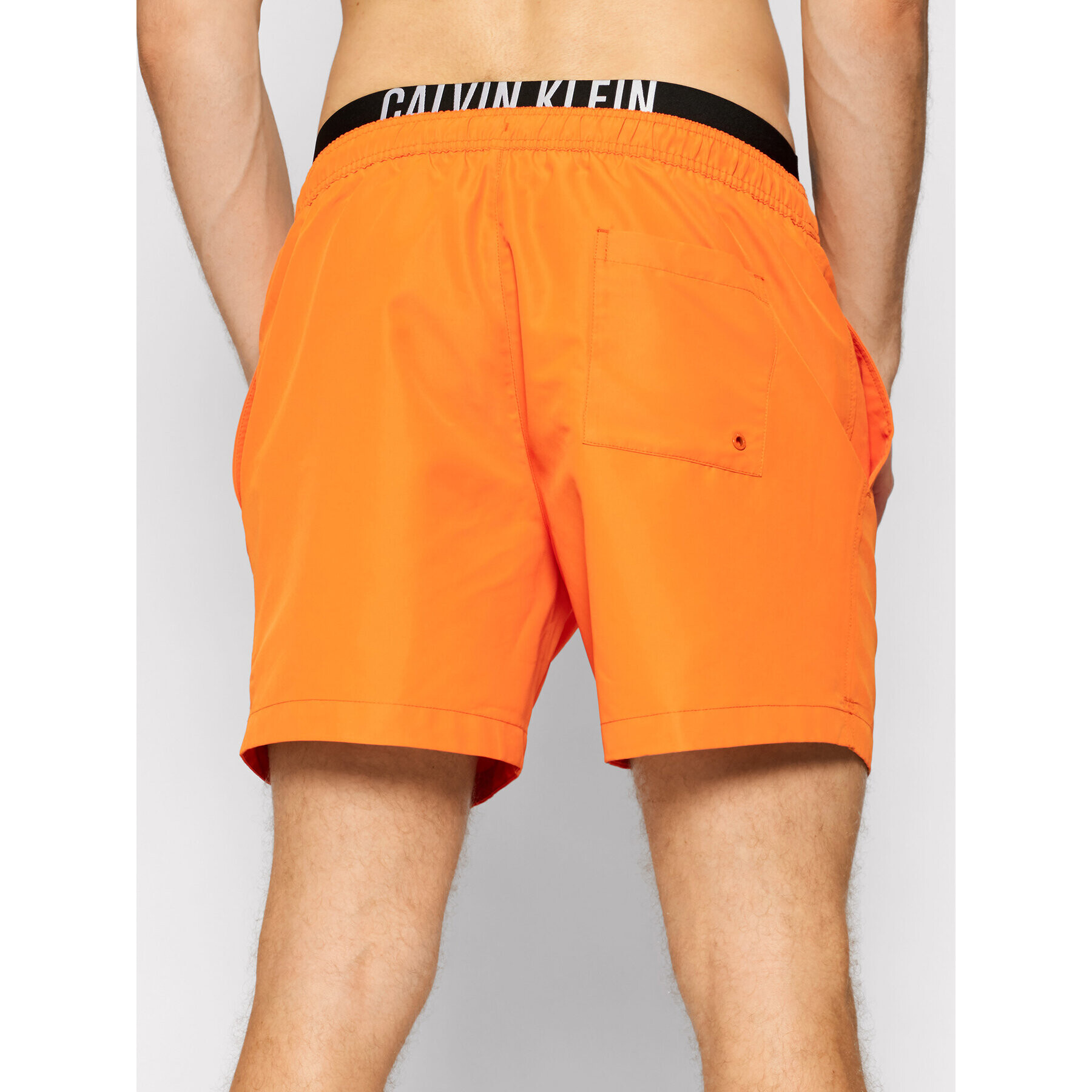 Calvin Klein Swimwear Plavecké šortky Medium Drawstring KM0KM00552 Oranžová Regular Fit - Pepit.cz