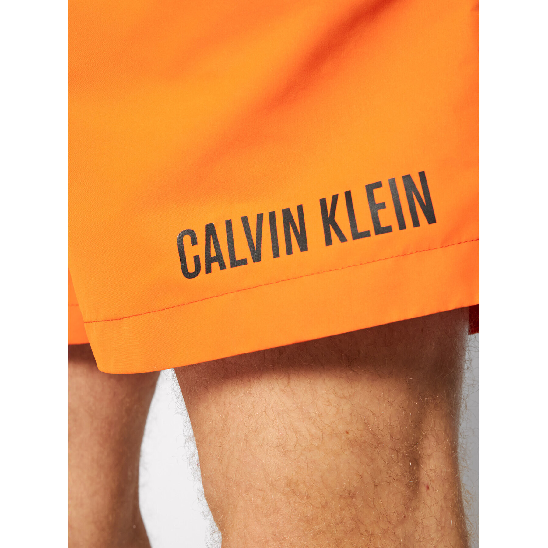 Calvin Klein Swimwear Plavecké šortky Medium Drawstring KM0KM00552 Oranžová Regular Fit - Pepit.cz