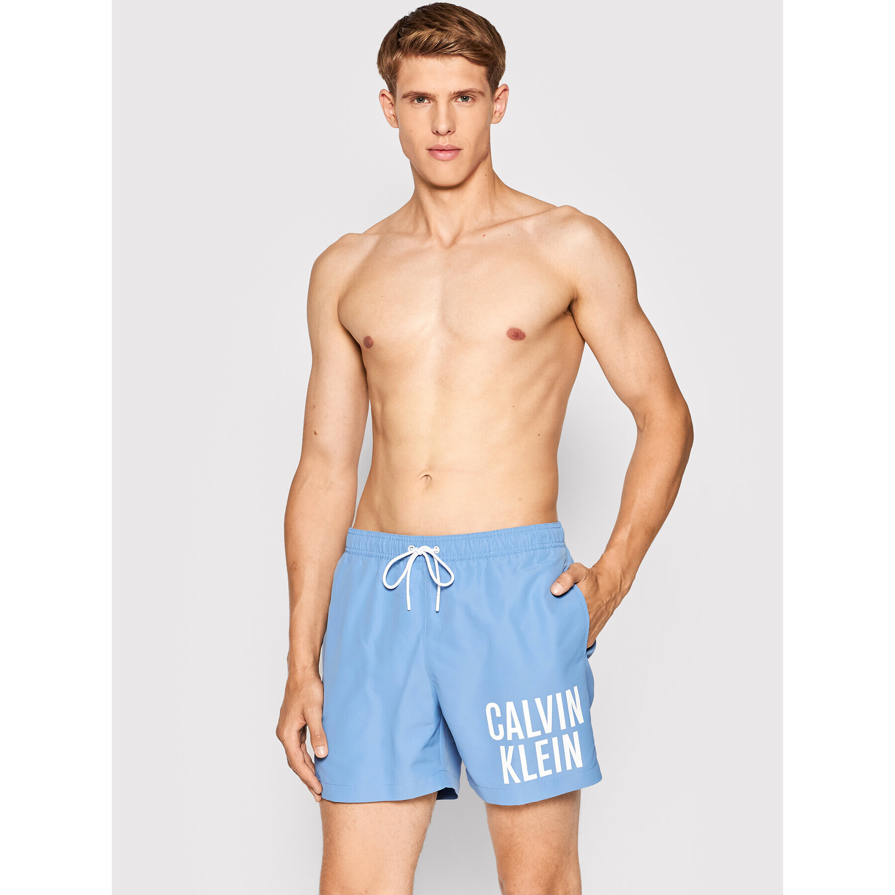 Calvin Klein Swimwear Plavecké šortky Medium Drawstring KM0KM00701 Modrá Regular Fit - Pepit.cz