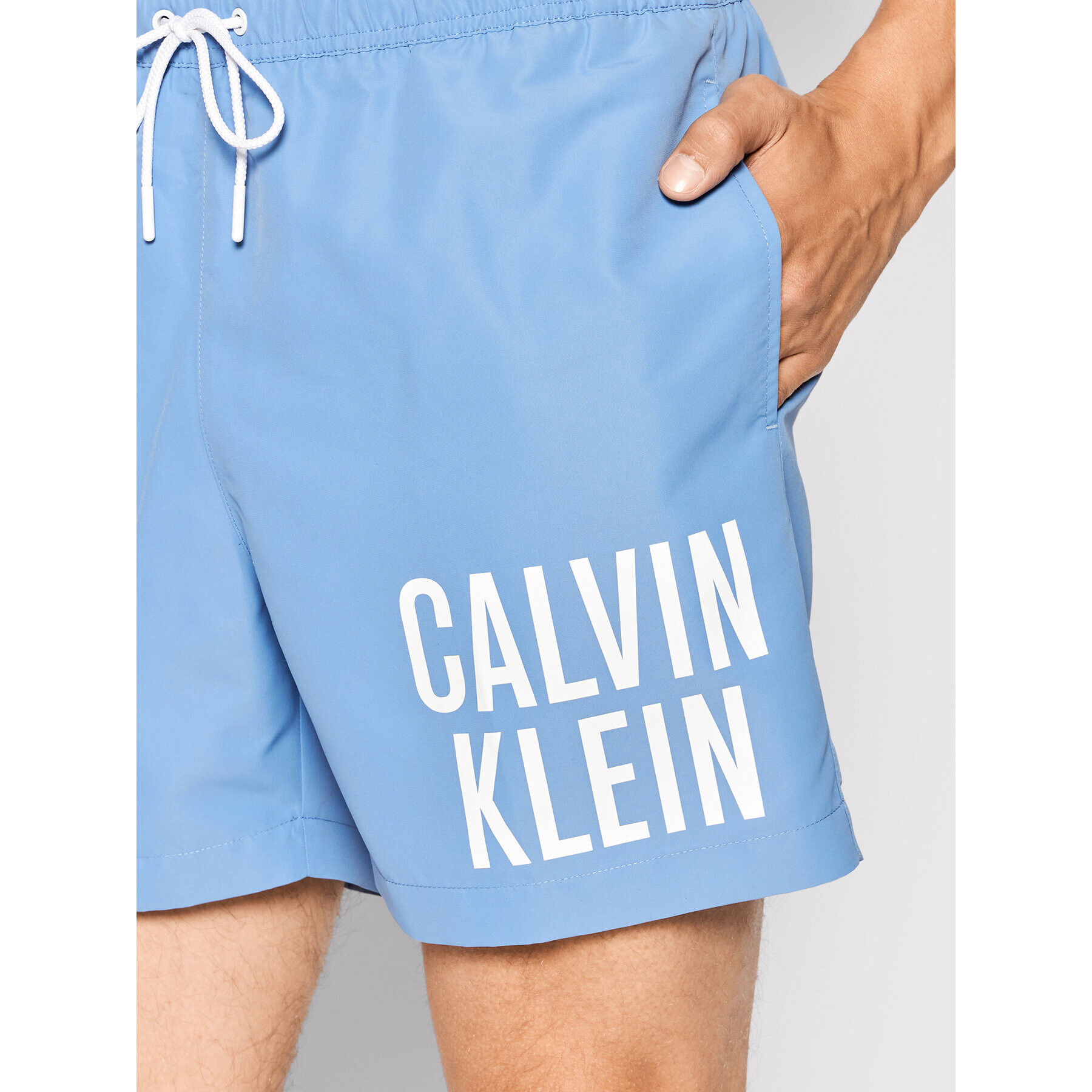 Calvin Klein Swimwear Plavecké šortky Medium Drawstring KM0KM00701 Modrá Regular Fit - Pepit.cz