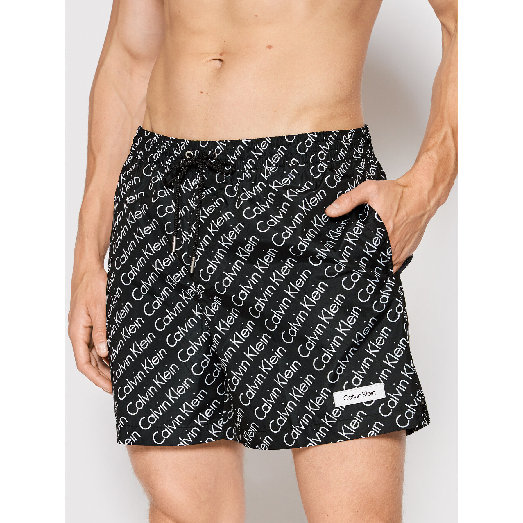 Calvin Klein Swimwear Plavecké šortky Medium Drawstring Print KM0KM00724 Černá Regular Fit - Pepit.cz