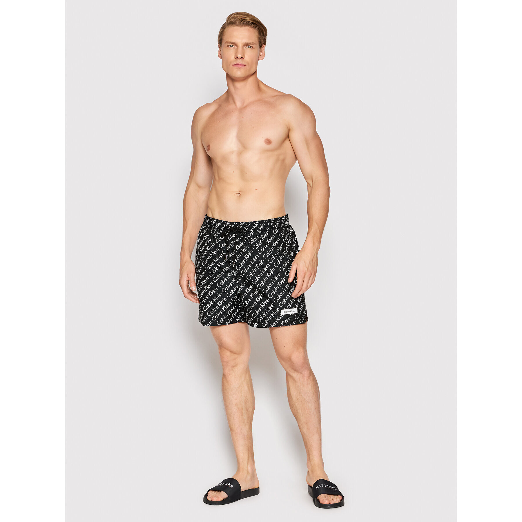 Calvin Klein Swimwear Plavecké šortky Medium Drawstring Print KM0KM00724 Černá Regular Fit - Pepit.cz