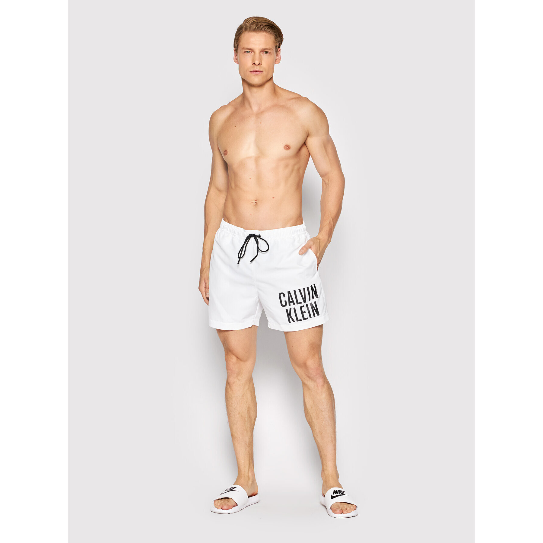 Calvin Klein Swimwear Plavecké šortky Medium KM0KM00701 Bílá Regular Fit - Pepit.cz