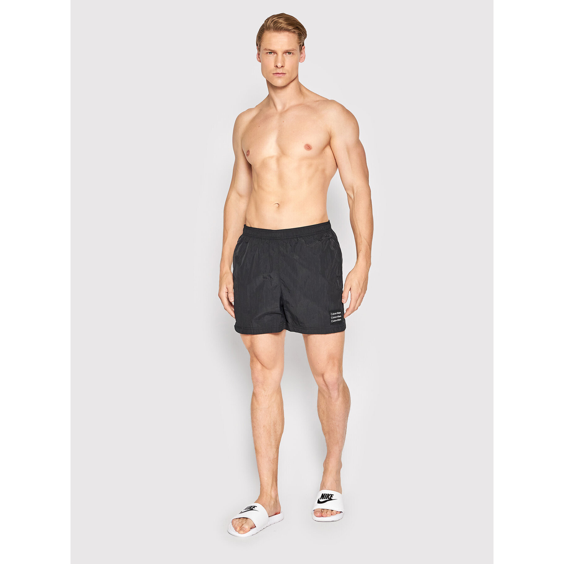 Calvin Klein Swimwear Plavecké šortky Medium KM0KM00712 Černá Regular Fit - Pepit.cz