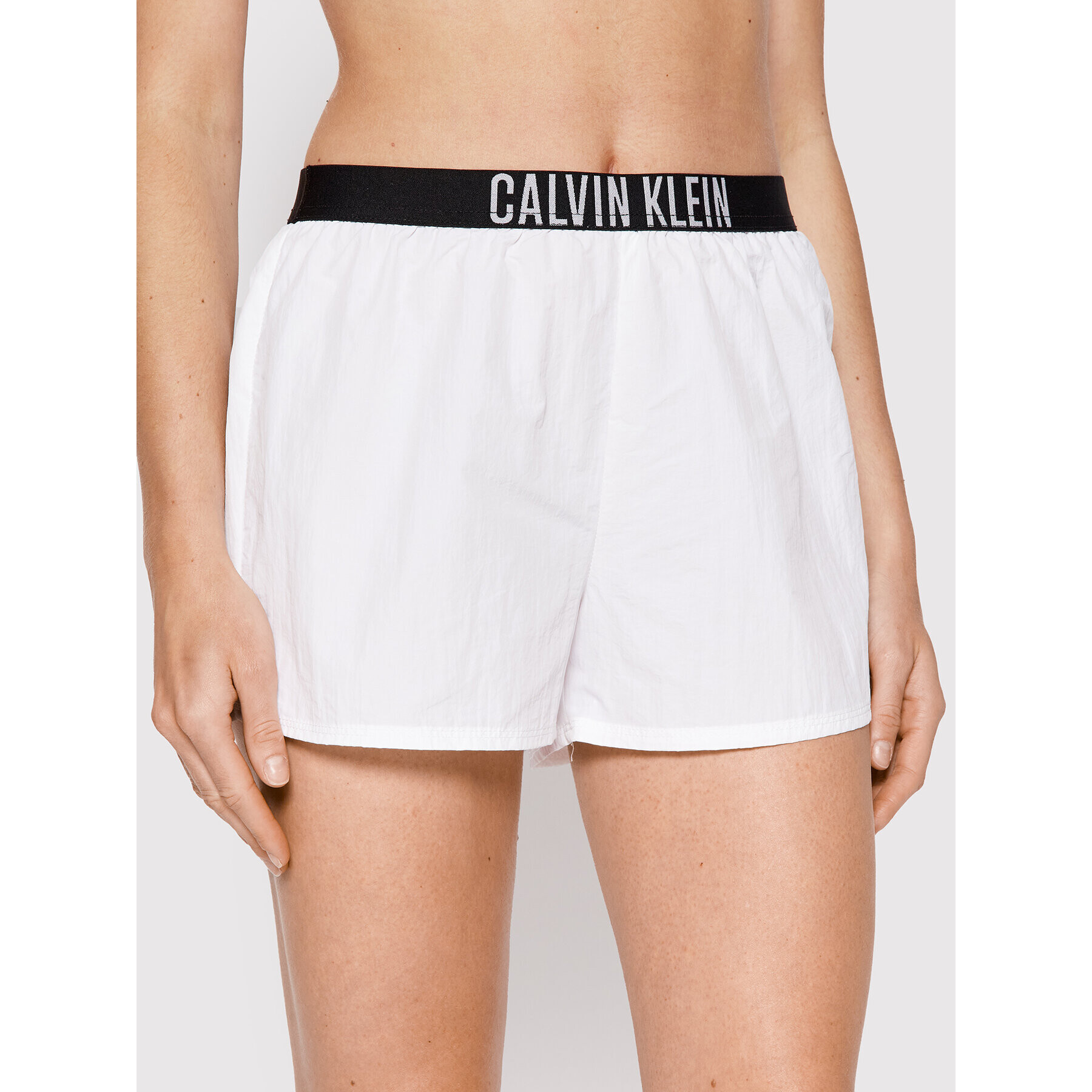 Calvin Klein Swimwear Plážové šortky KW0KW01777 Bílá Regular Fit - Pepit.cz