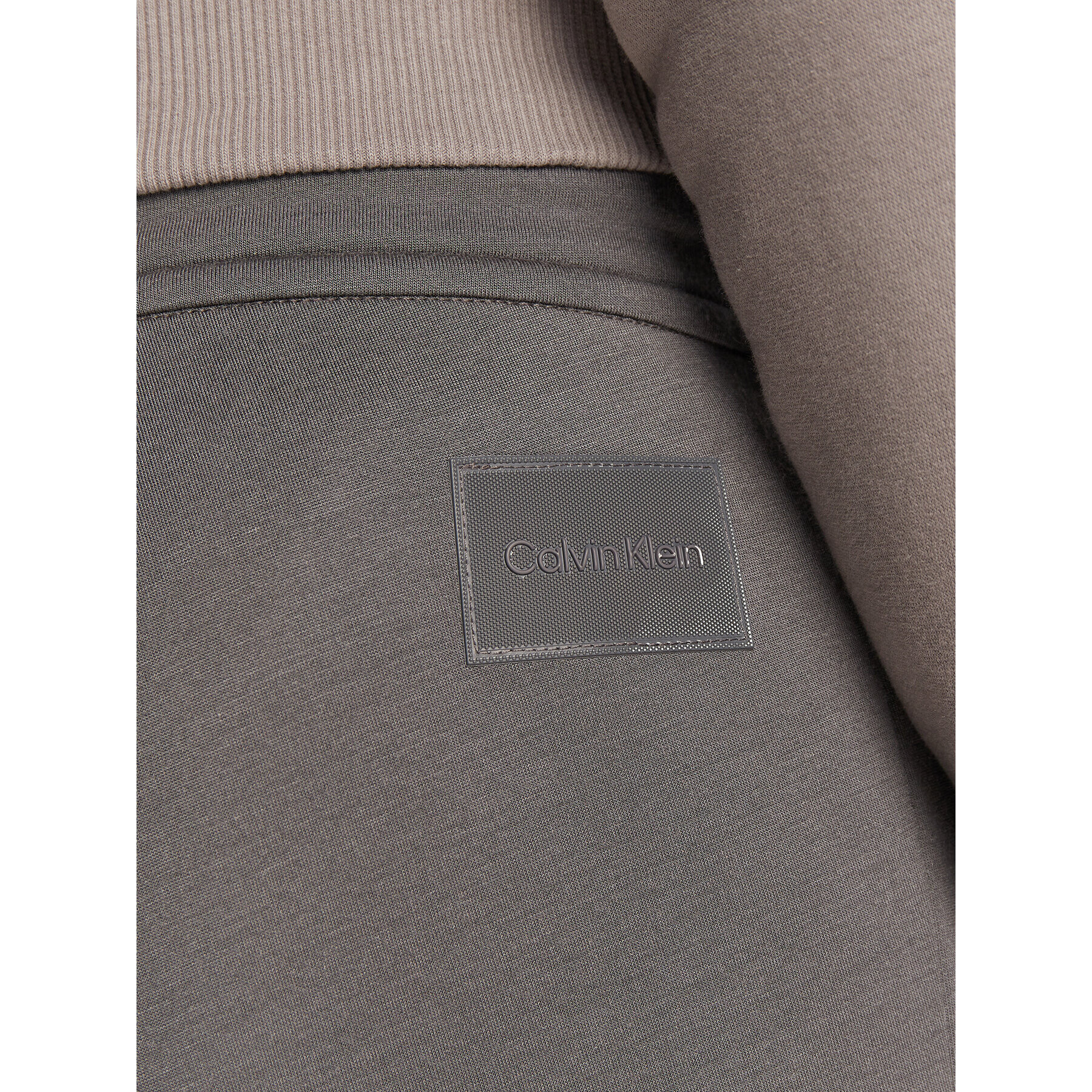 Calvin Klein Teplákové kalhoty Iconic K10K110196 Šedá Relaxed Fit - Pepit.cz