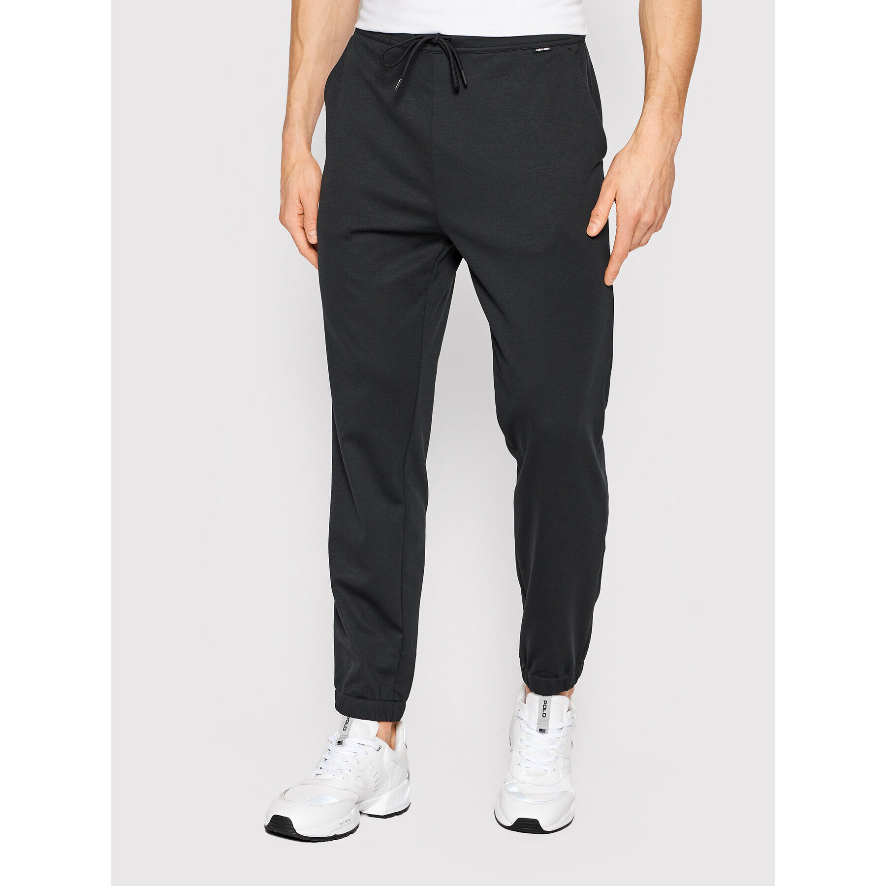 Calvin Klein Teplákové kalhoty K10K108646 Černá Slim Fit - Pepit.cz