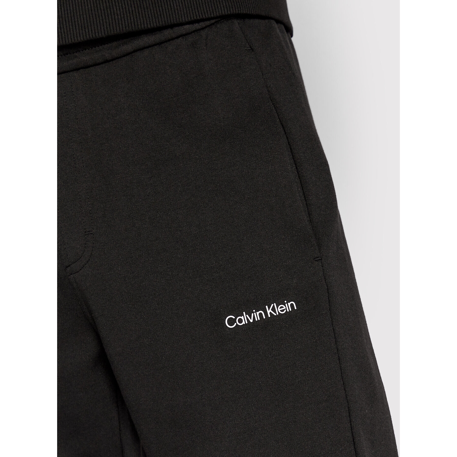 Calvin Klein Teplákové kalhoty Micro Logo K10K109940 Černá Relaxed Fit - Pepit.cz