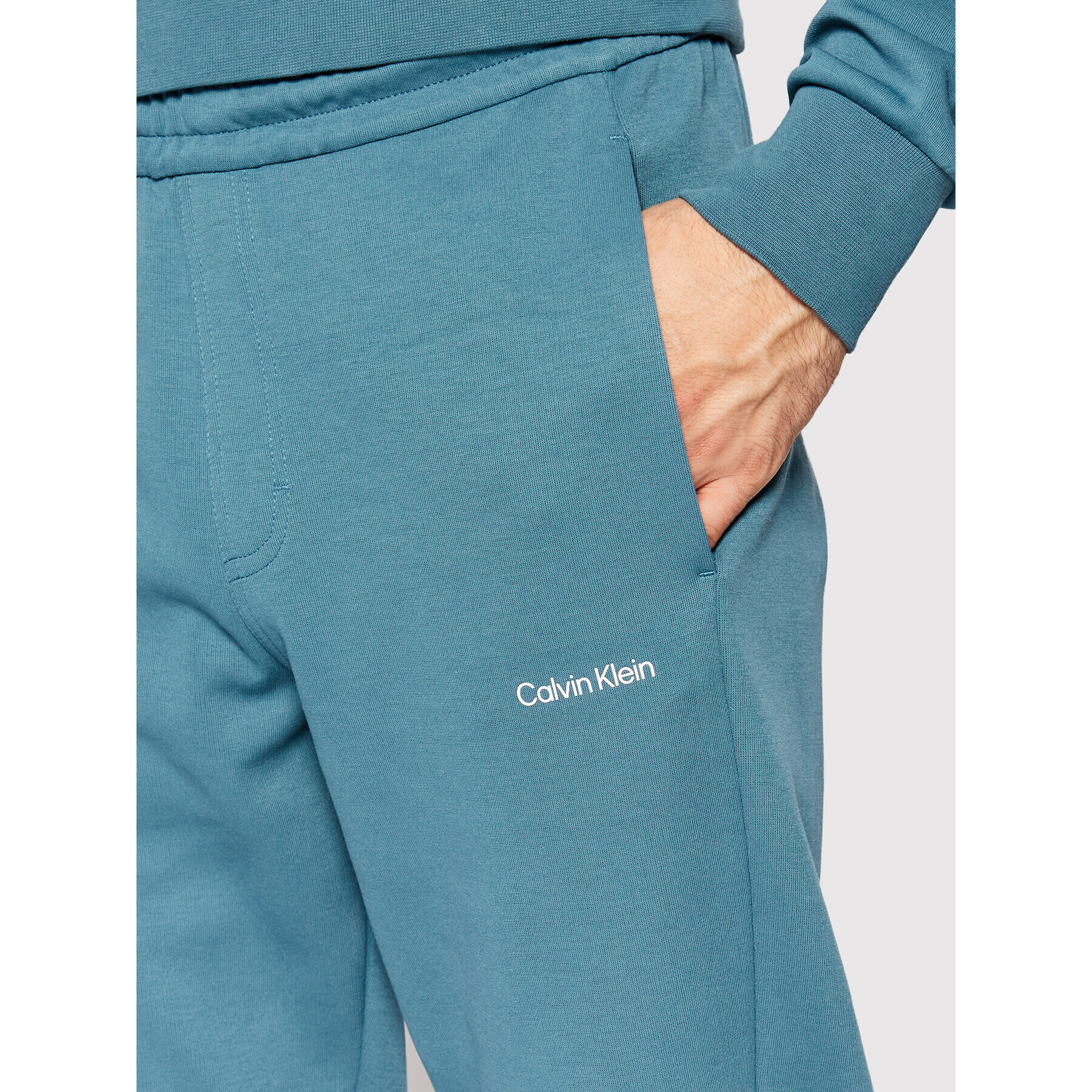 Calvin Klein Teplákové kalhoty Micro Logo K10K109940 Modrá Relaxed Fit - Pepit.cz