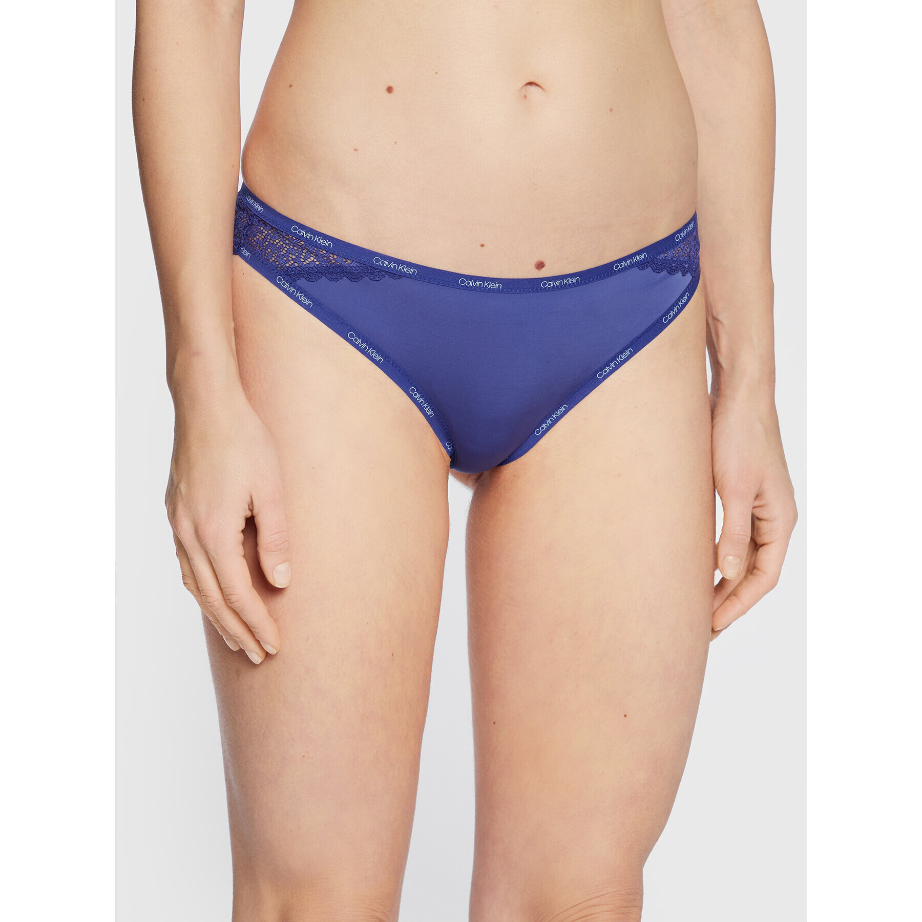 Calvin Klein Underwear Brazilské kalhotky 000QF5152E Modrá - Pepit.cz