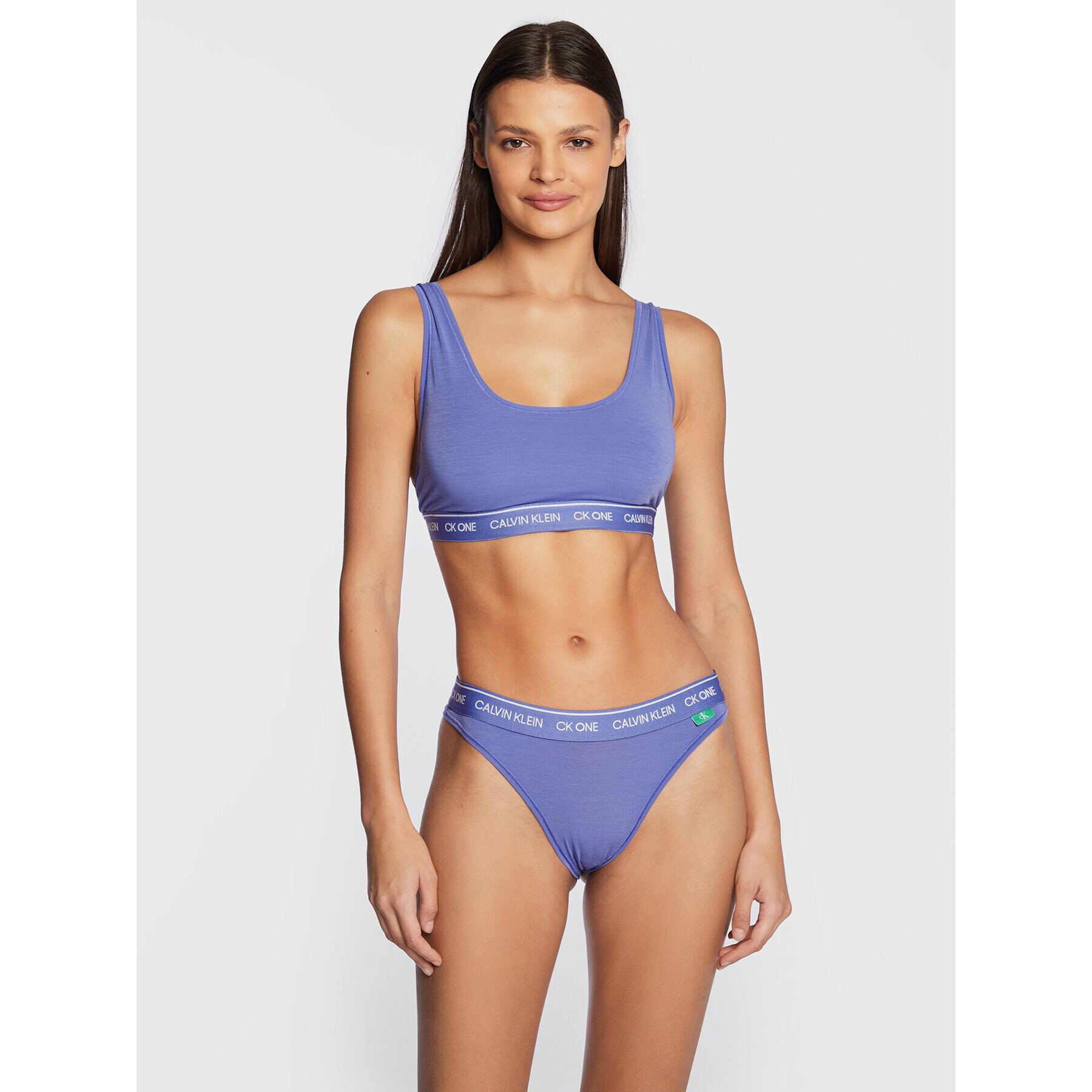 Calvin Klein Underwear Brazilské kalhotky 000QF6505E Modrá - Pepit.cz