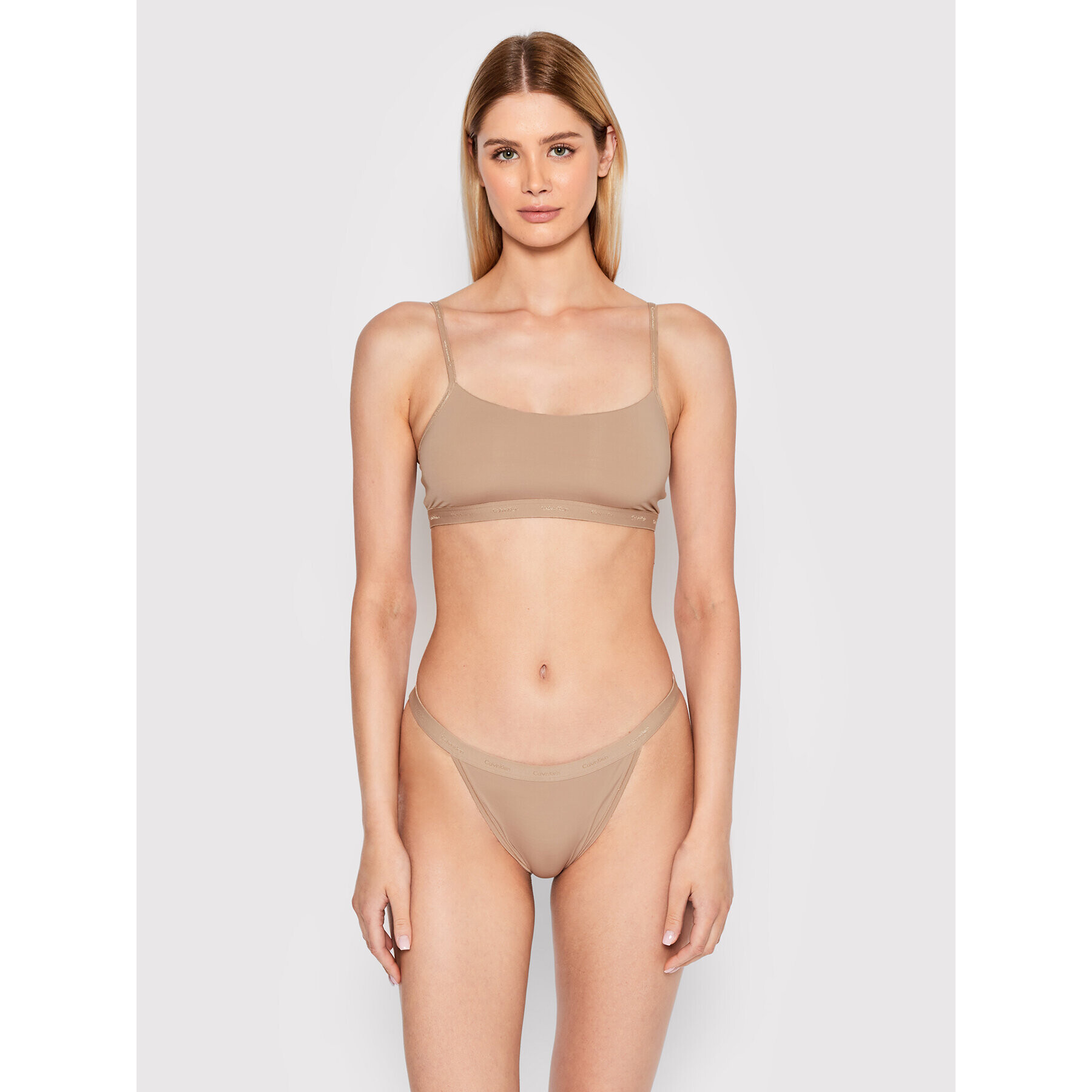 Calvin Klein Underwear Brazilské kalhotky 000QF6760E Béžová - Pepit.cz