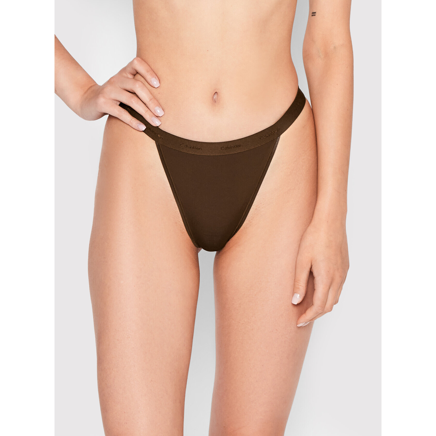 Calvin Klein Underwear Brazilské kalhotky 000QF6760E Hnědá - Pepit.cz