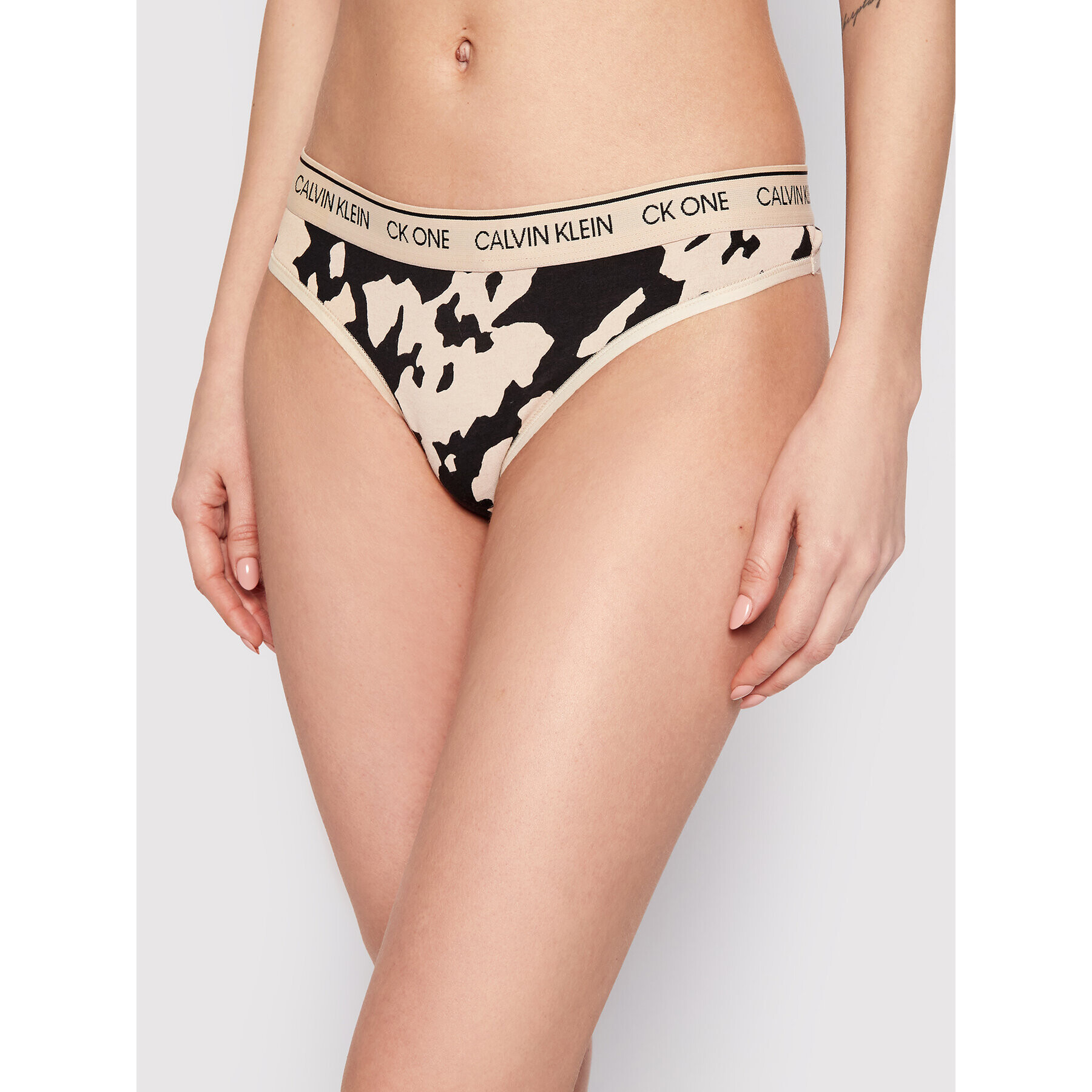 Calvin Klein Underwear Kalhotky string 000QF5733E Béžová - Pepit.cz