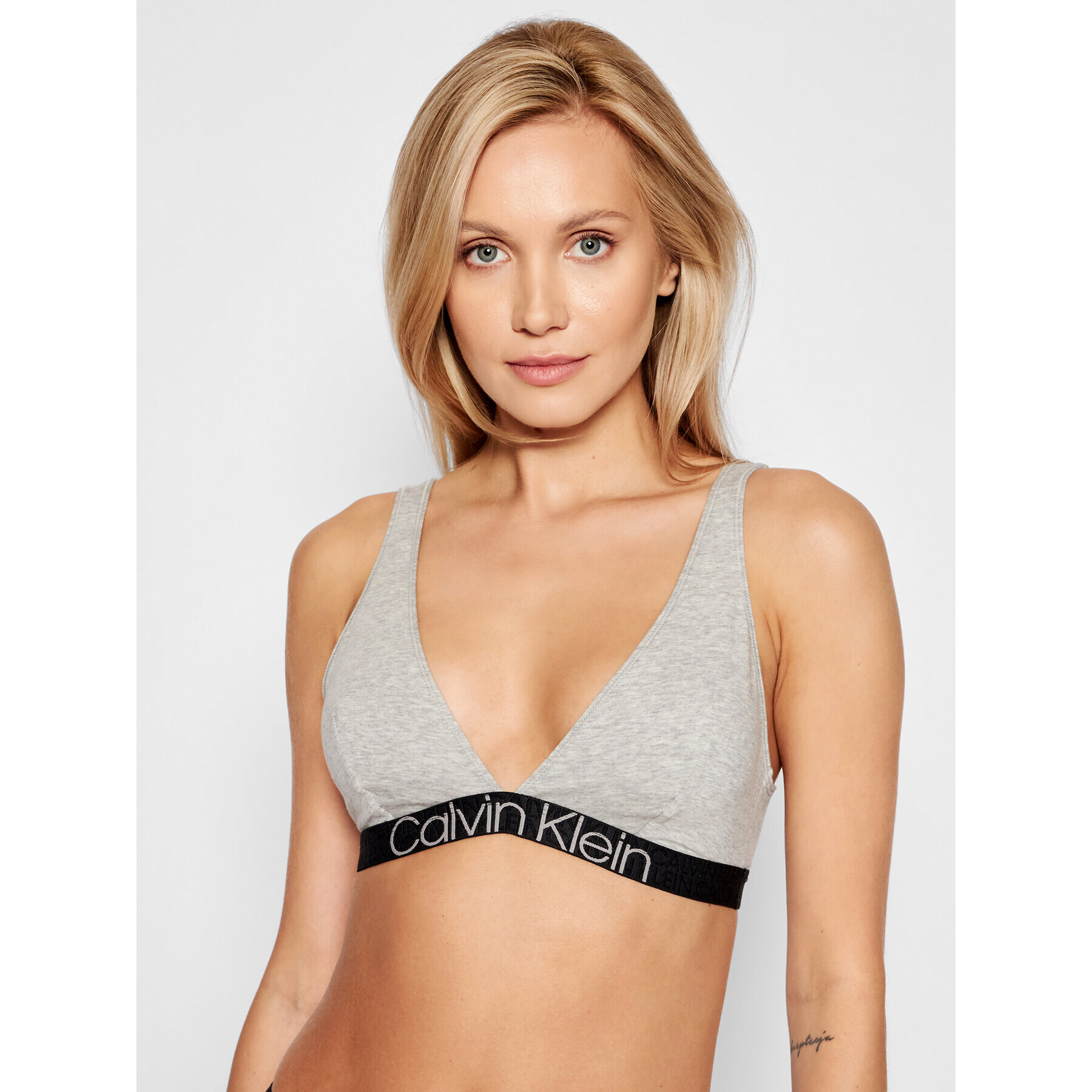 Calvin Klein Underwear Podprsenka Bralette 000QF6577E Šedá - Pepit.cz