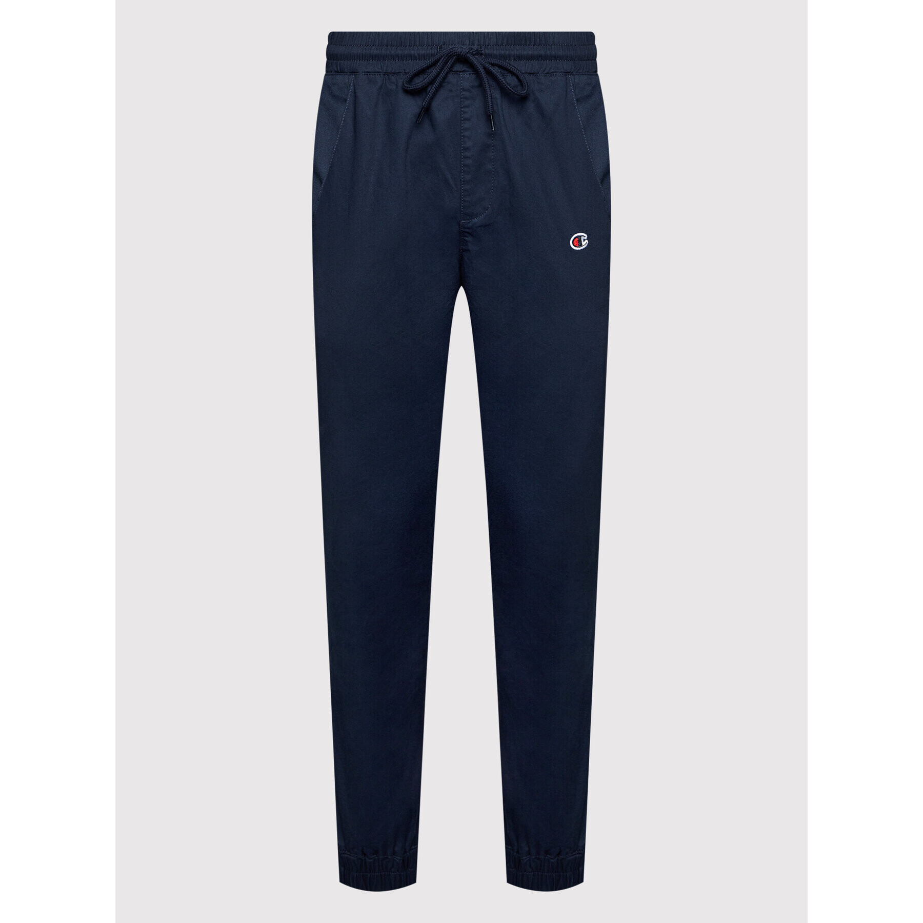 Champion Joggers kalhoty Twill Cuffed 214366 Tmavomodrá Slim Fit - Pepit.cz