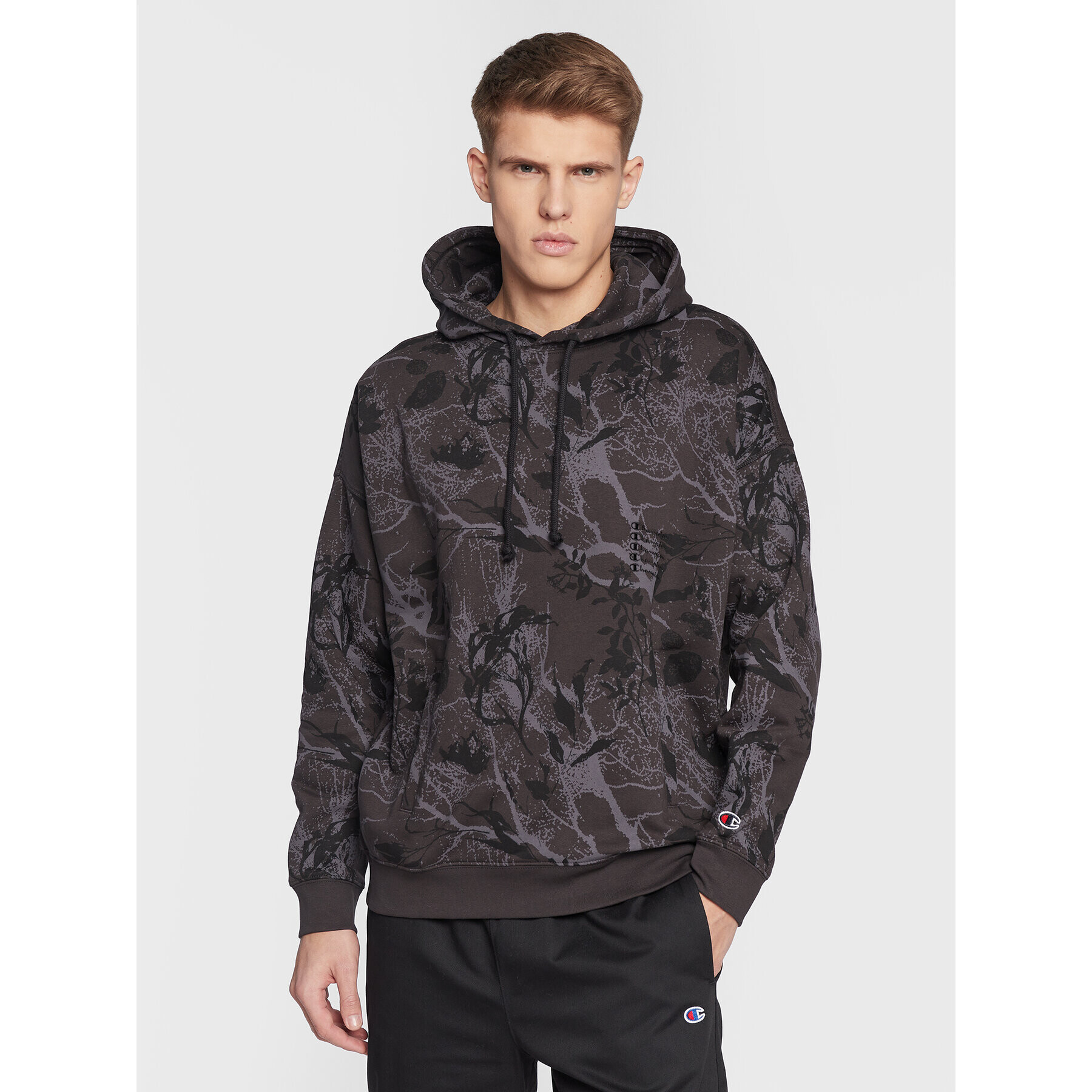 Champion Mikina All-Over Nature Print 217914 Černá Baggy Fit - Pepit.cz