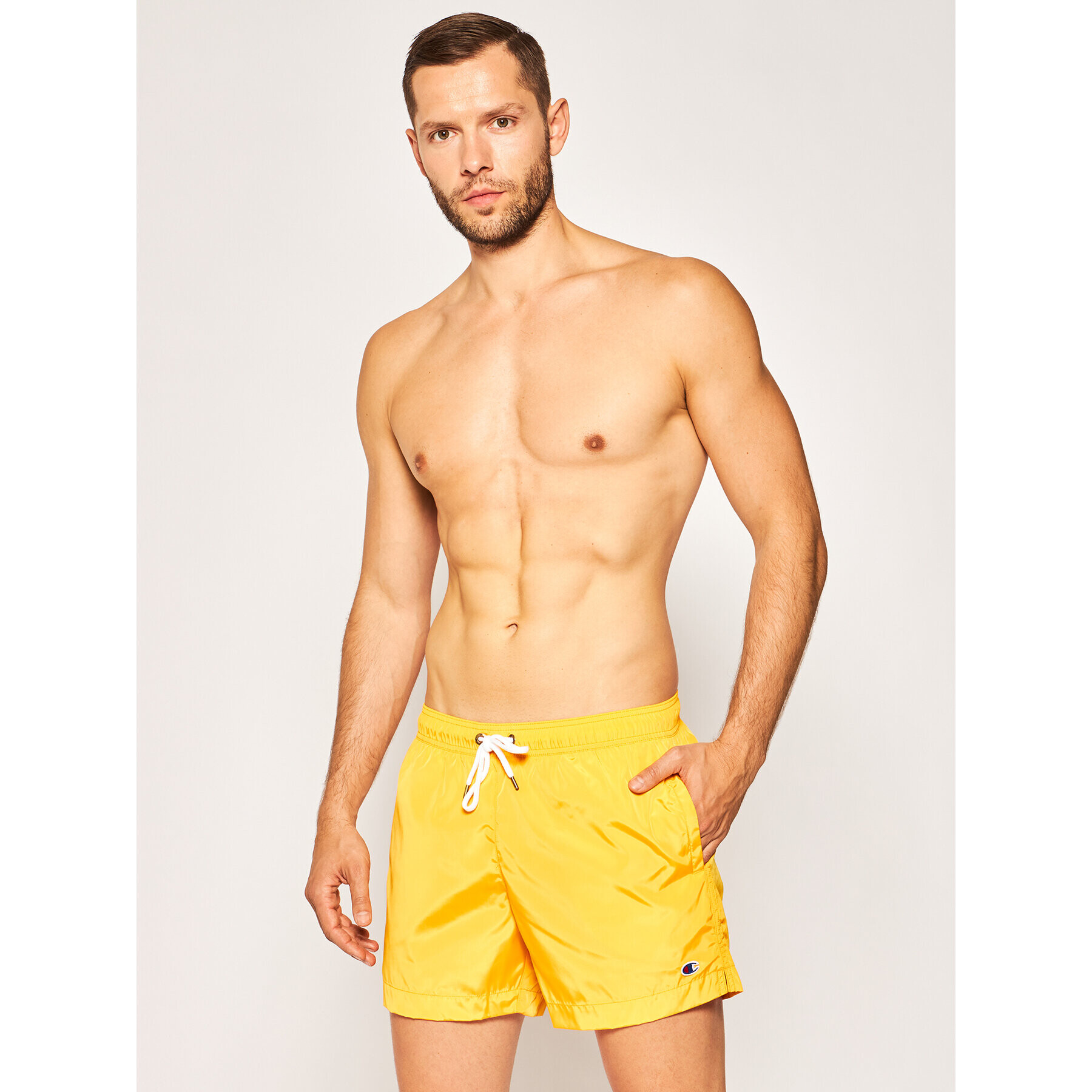 Champion Plavecké šortky Small C Logo Swim 214453 Žlutá Regular Fit - Pepit.cz