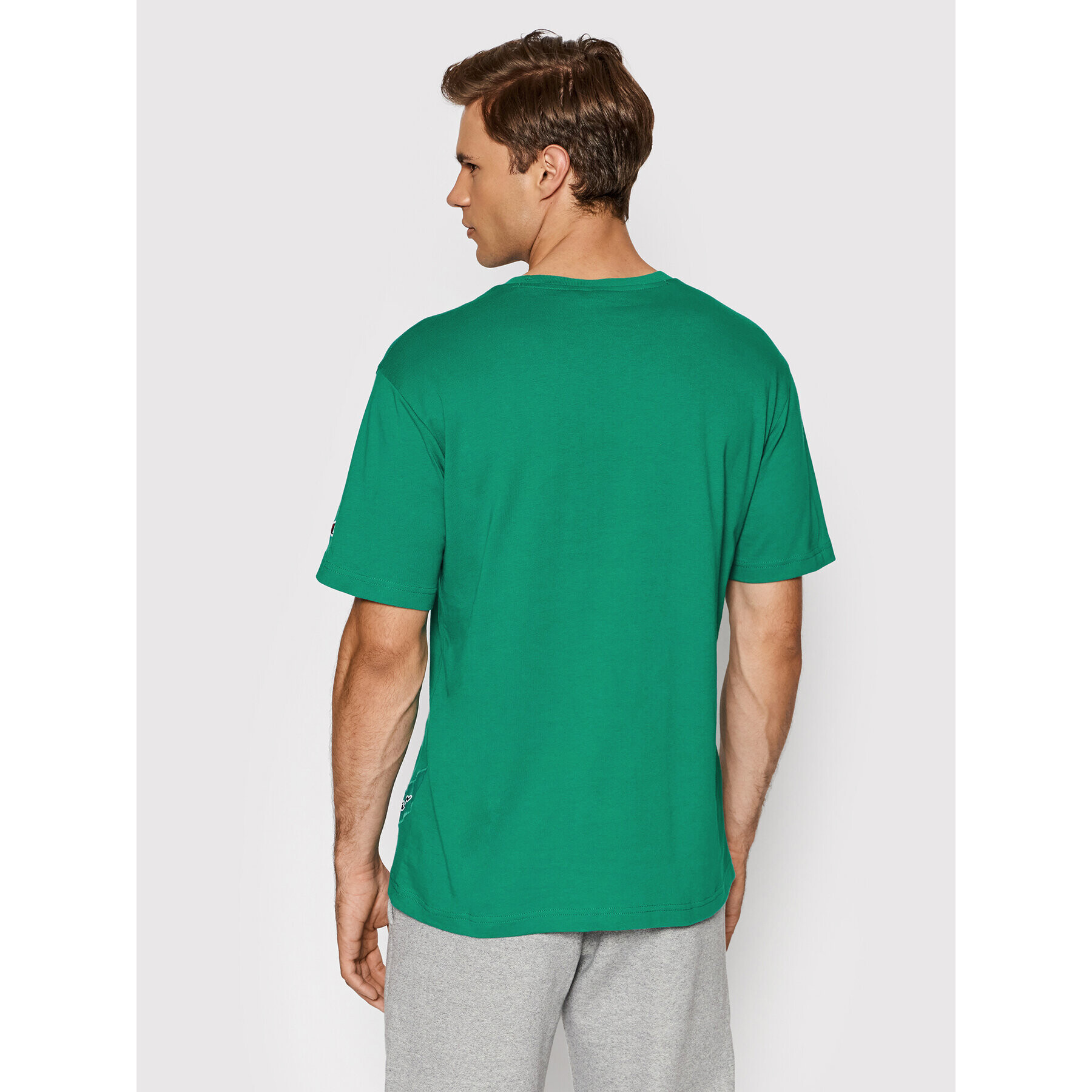 Champion T-Shirt Asymmetric Script Logo 216553 Zelená Regular Fit - Pepit.cz