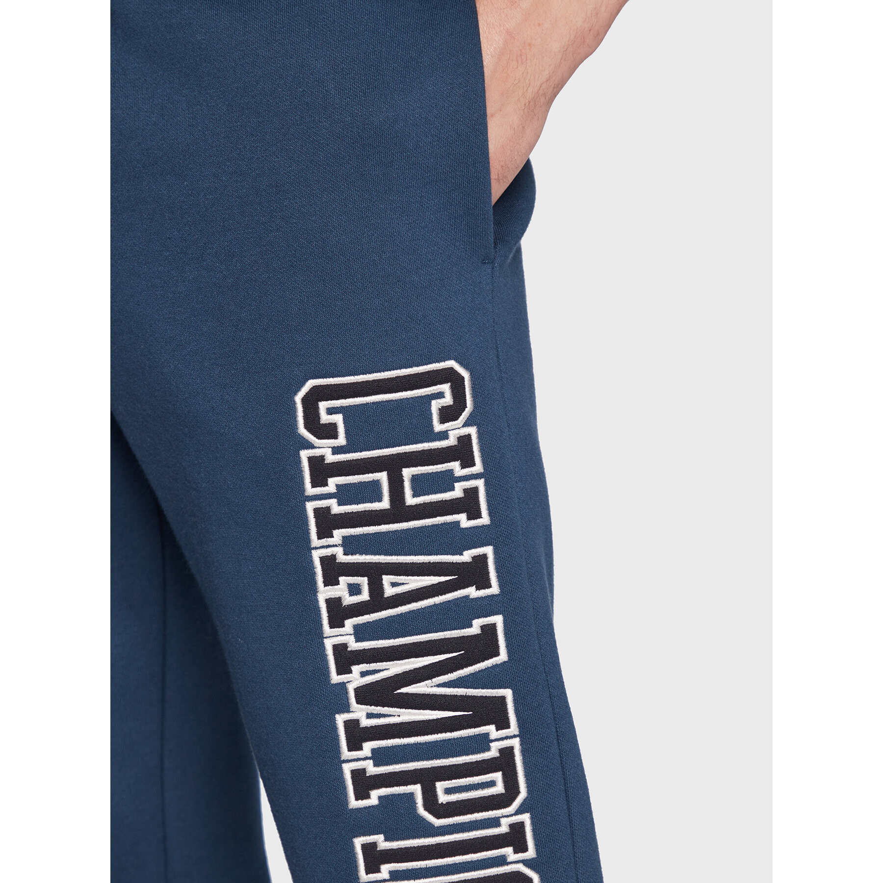 Champion Teplákové kalhoty Heavy Fleece Bookstore Logo 217880 Tmavomodrá Regular Fit - Pepit.cz