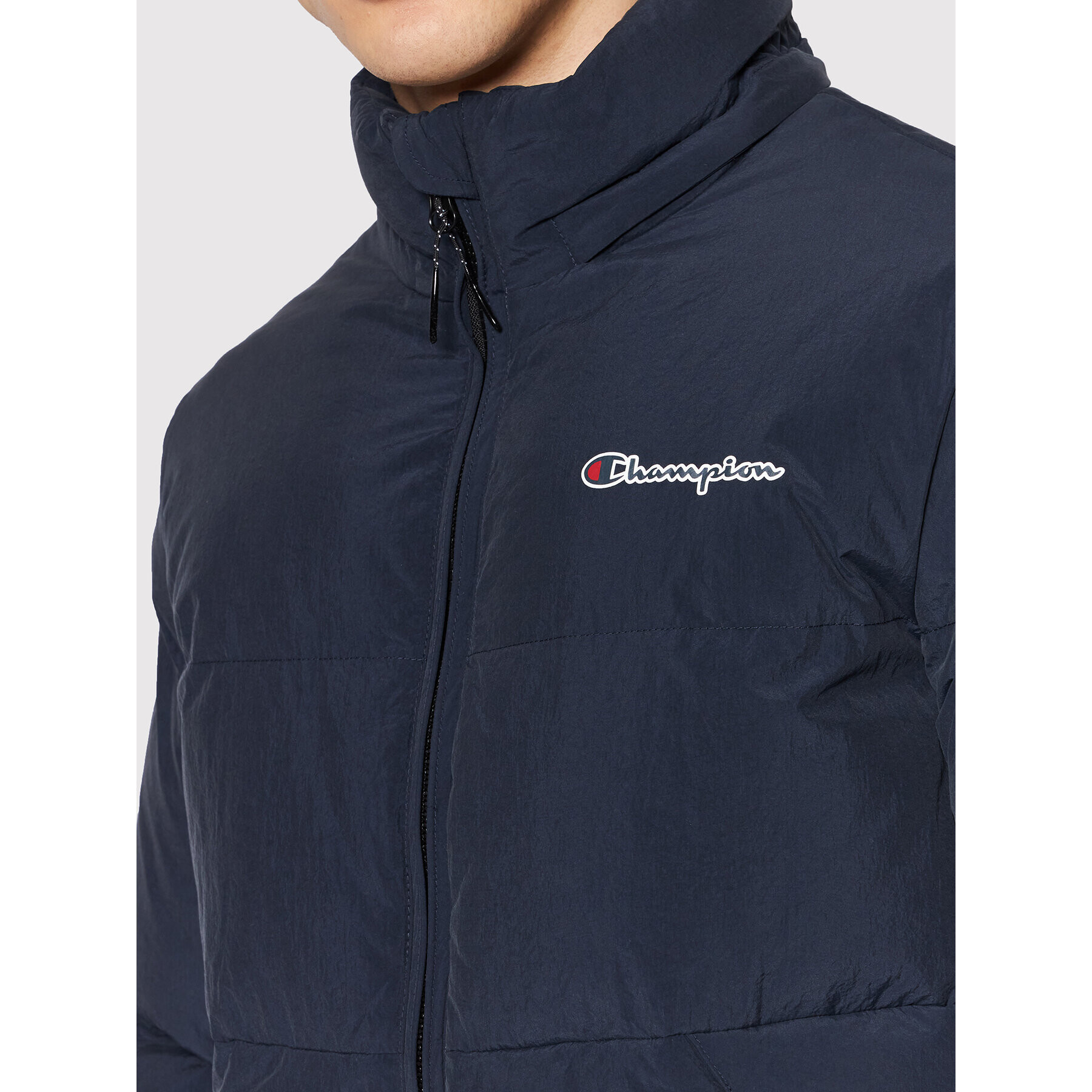 Champion Vatovaná bunda Logo Script 216953 Tmavomodrá Regular Fit - Pepit.cz