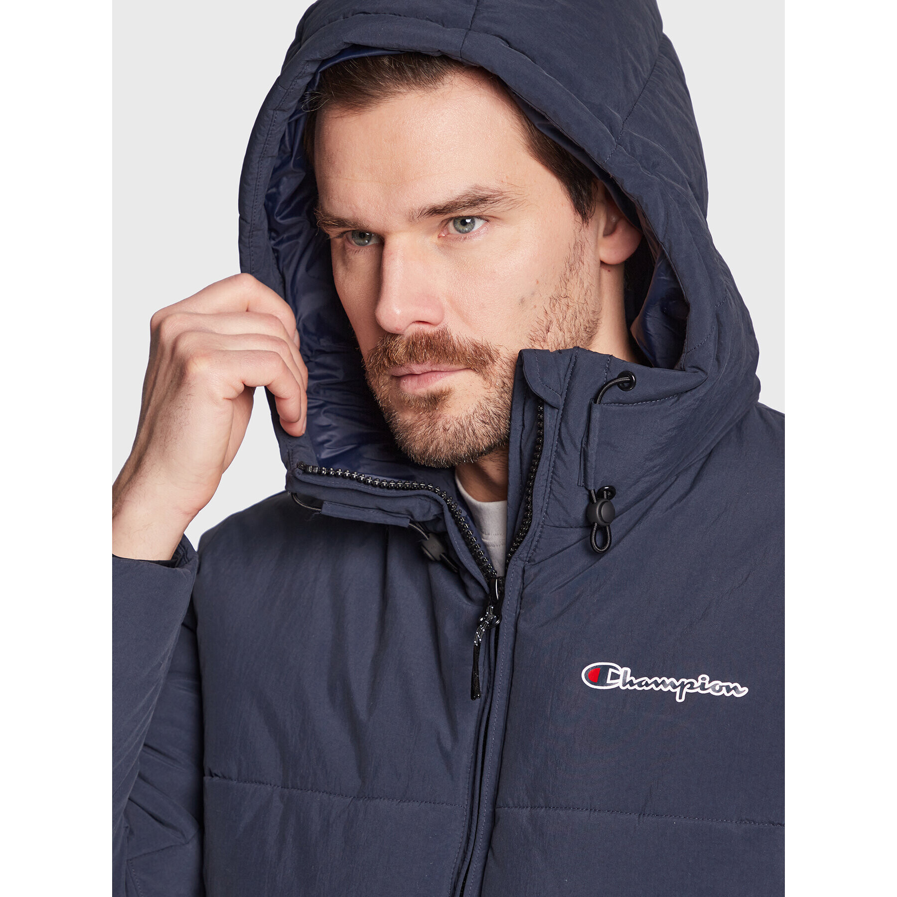 Champion Vatovaná bunda Script Logo 218083 Tmavomodrá Regular Fit - Pepit.cz